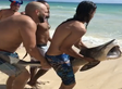 Brave Beachgoers Take Huge Chance To Rescue Tiger Shark