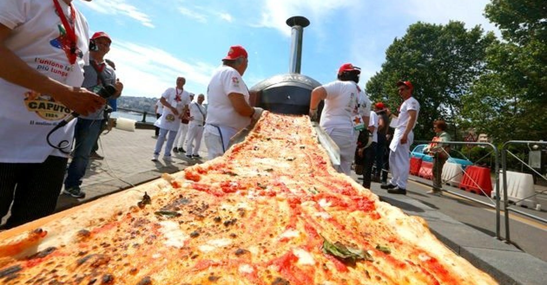 the-longest-pizza-in-the-world-is-not-for-the-faint-of-heart-huffpost