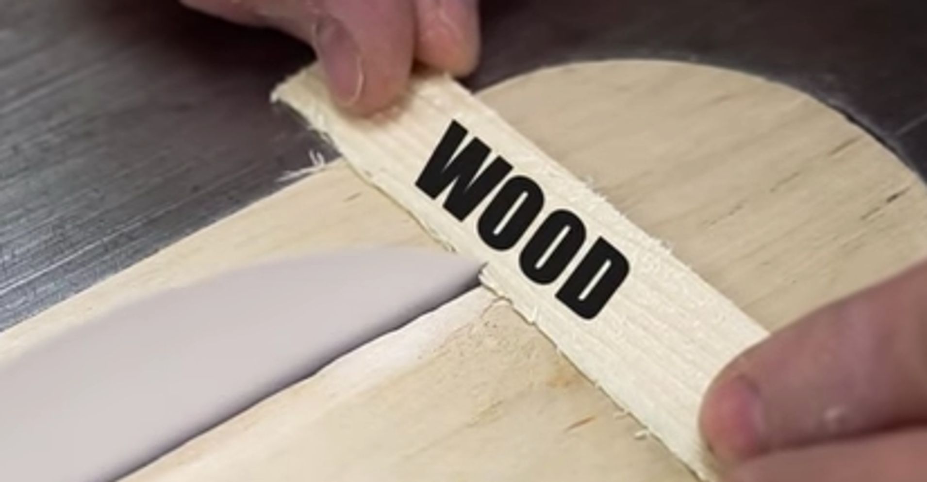 carpenter-uses-flimsy-sheet-of-paper-to-saw-through-wood-huffpost