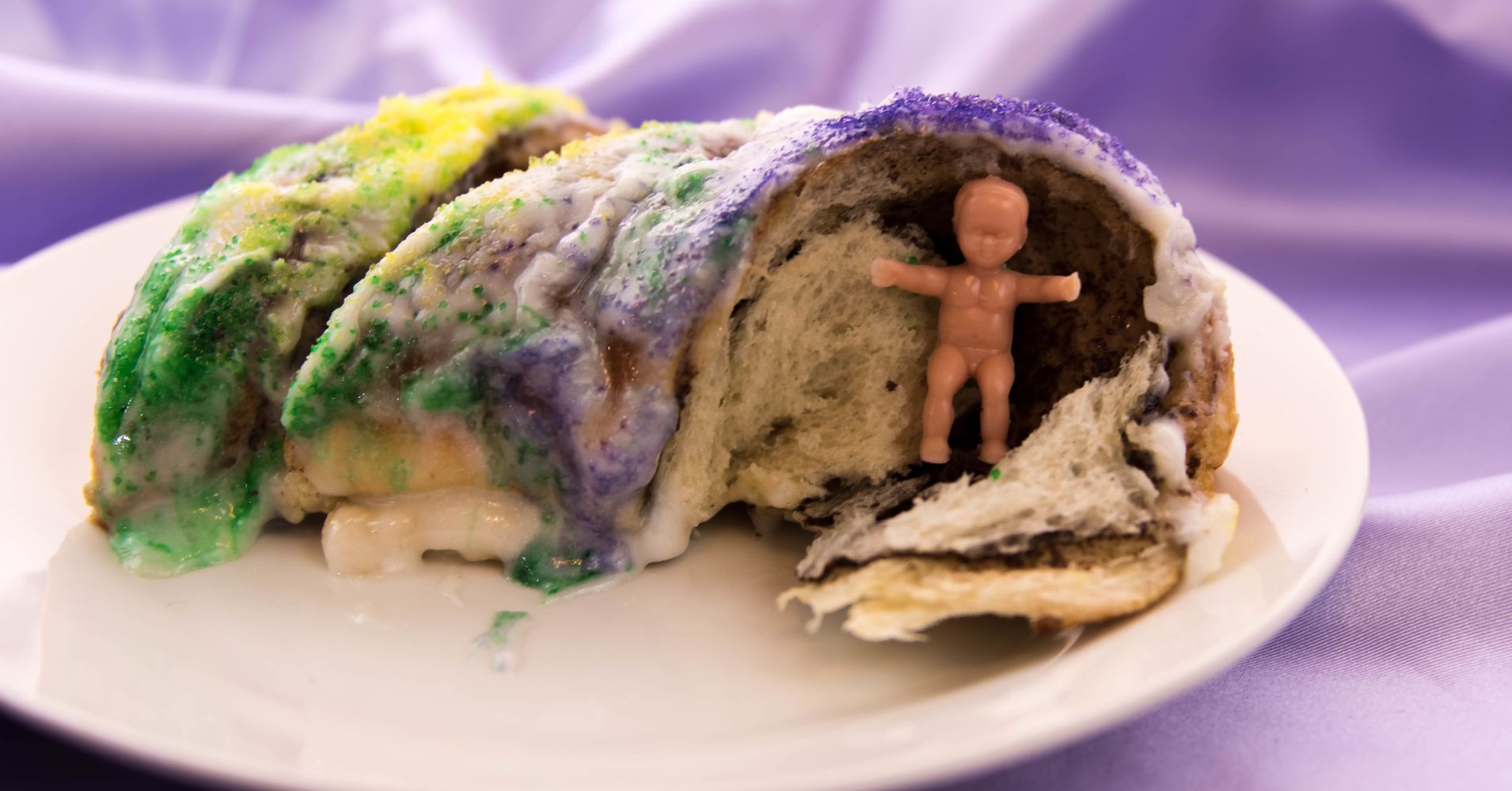 here-s-why-there-s-a-plastic-baby-jesus-hiding-inside-your-king-cake