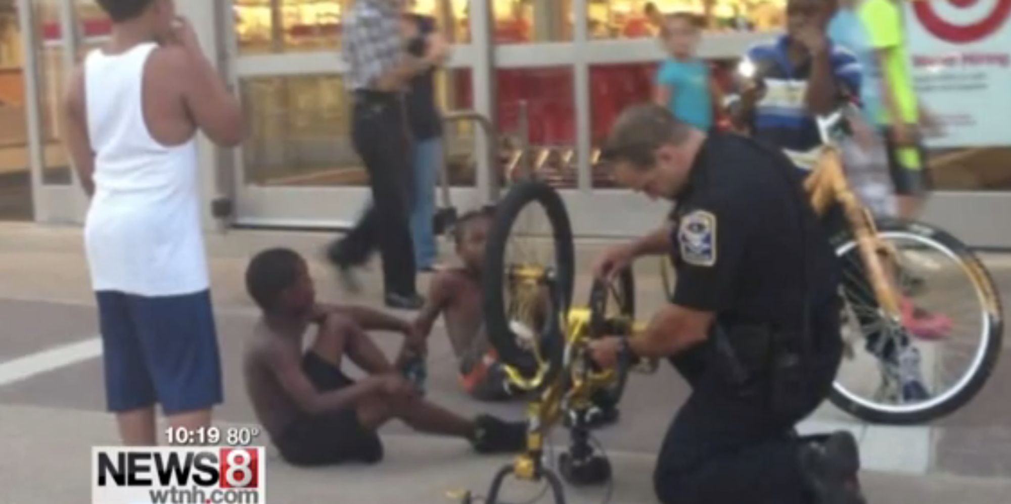 Cop Fixes Boy's Bike, Takes 'Serve And Protect' To Whole New Level