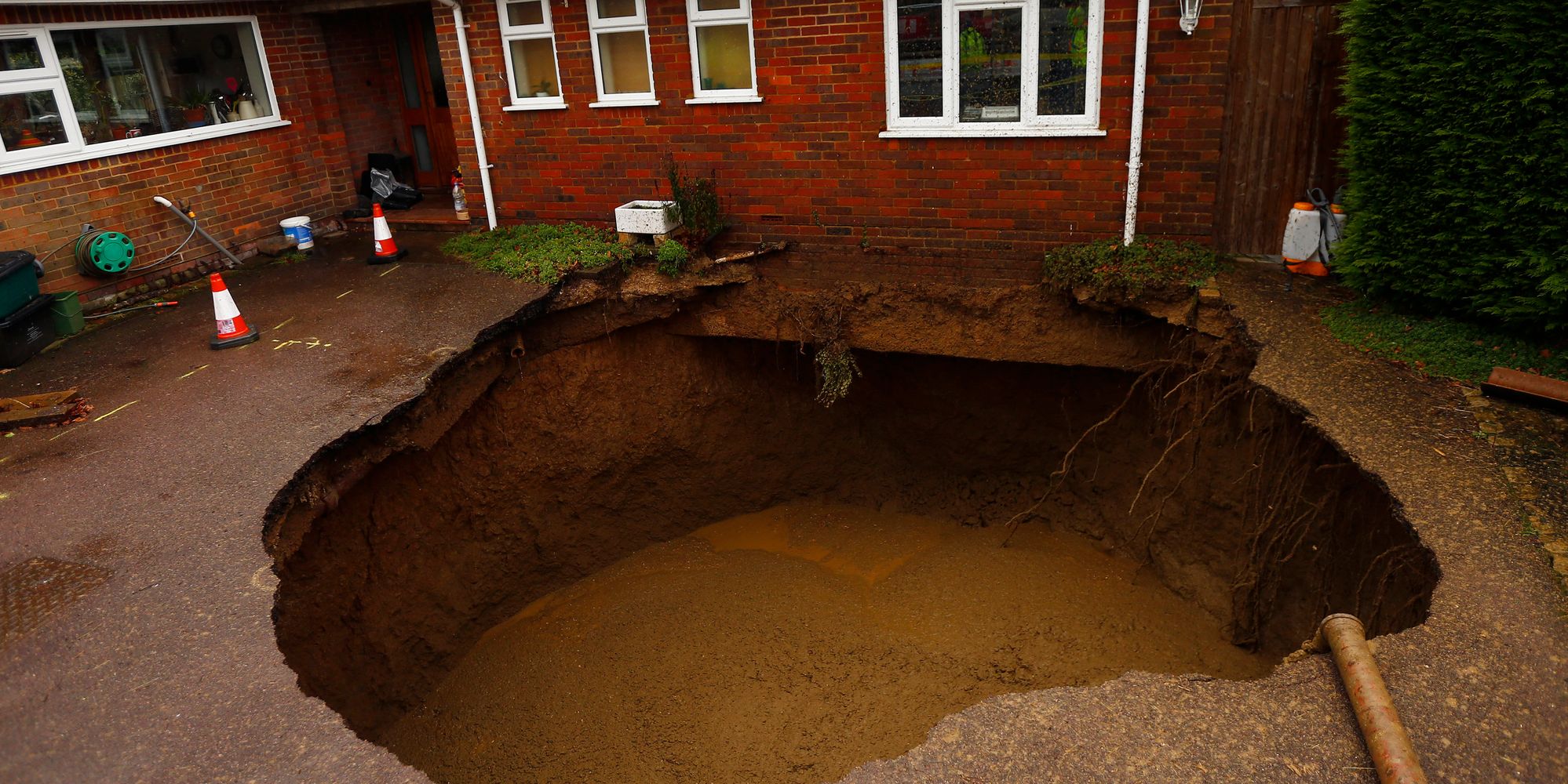 What Is A Sinkhole And What Causes Them Huffpost Uk 7364