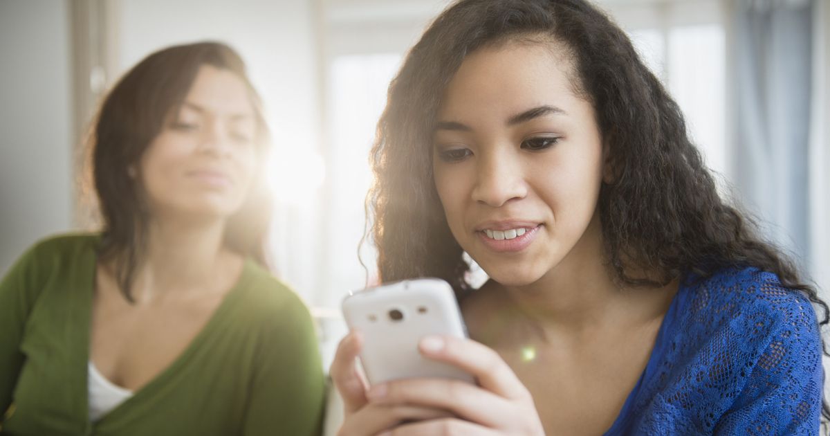 Teen Girl With Phone