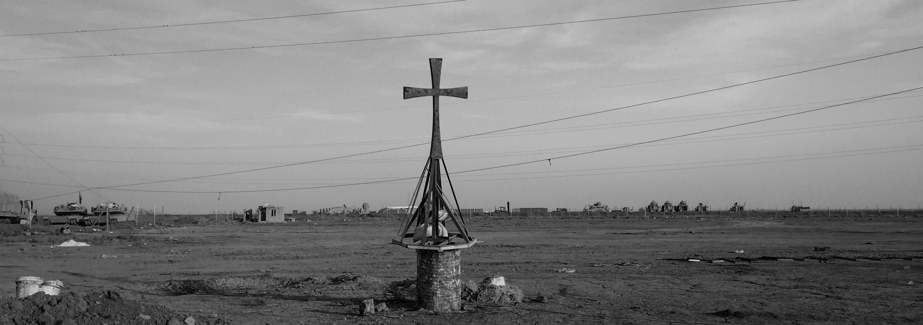 A damaged cross at the Iraqi Army Armoured Ninth Division base on Nov. 13, 2016, in Qaraqosh, Iraq.