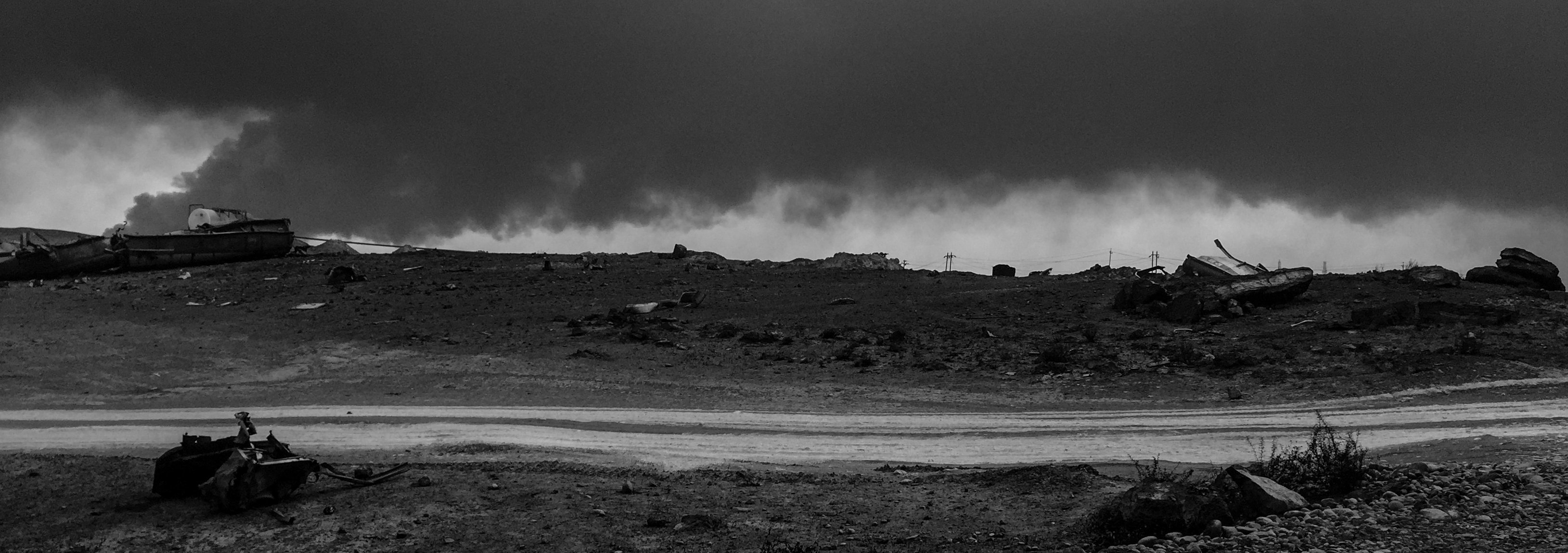 A general view of the burnt landscape scorched by airstrikes and covered in ash and oil from burning oil wells set on fire by fleeing ISIS members on Nov.&nbsp;10, 2016 in Al Qayyarah, Iraq.