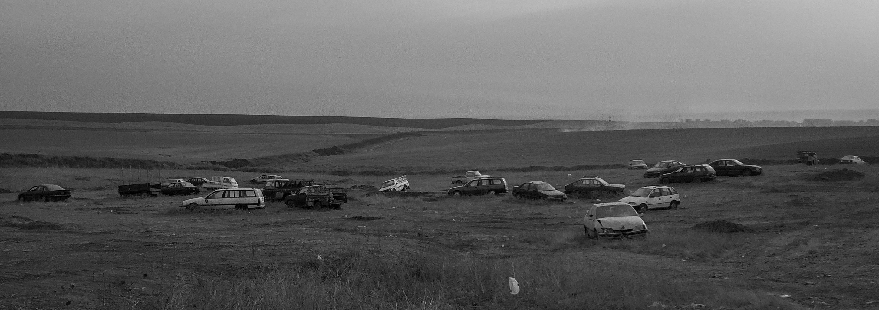 Abandoned cars are seen in a field on the side of a road leading to Mosul on November 15, 2016 in Mosul, Iraq.&nbsp;