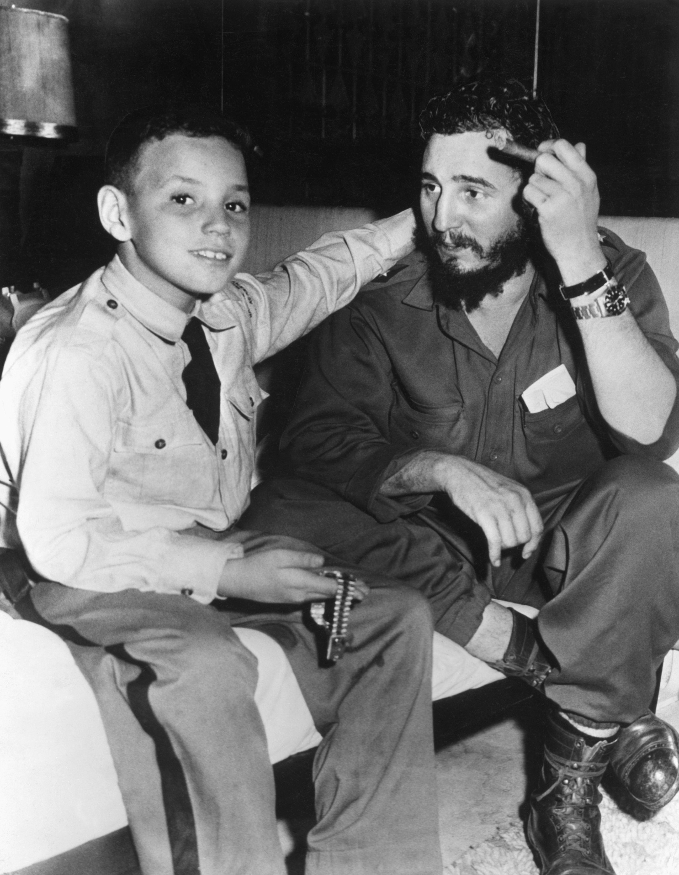 Castro sits&nbsp;with his son Fidelito in the Hotel Hilton in Havana in 1959.