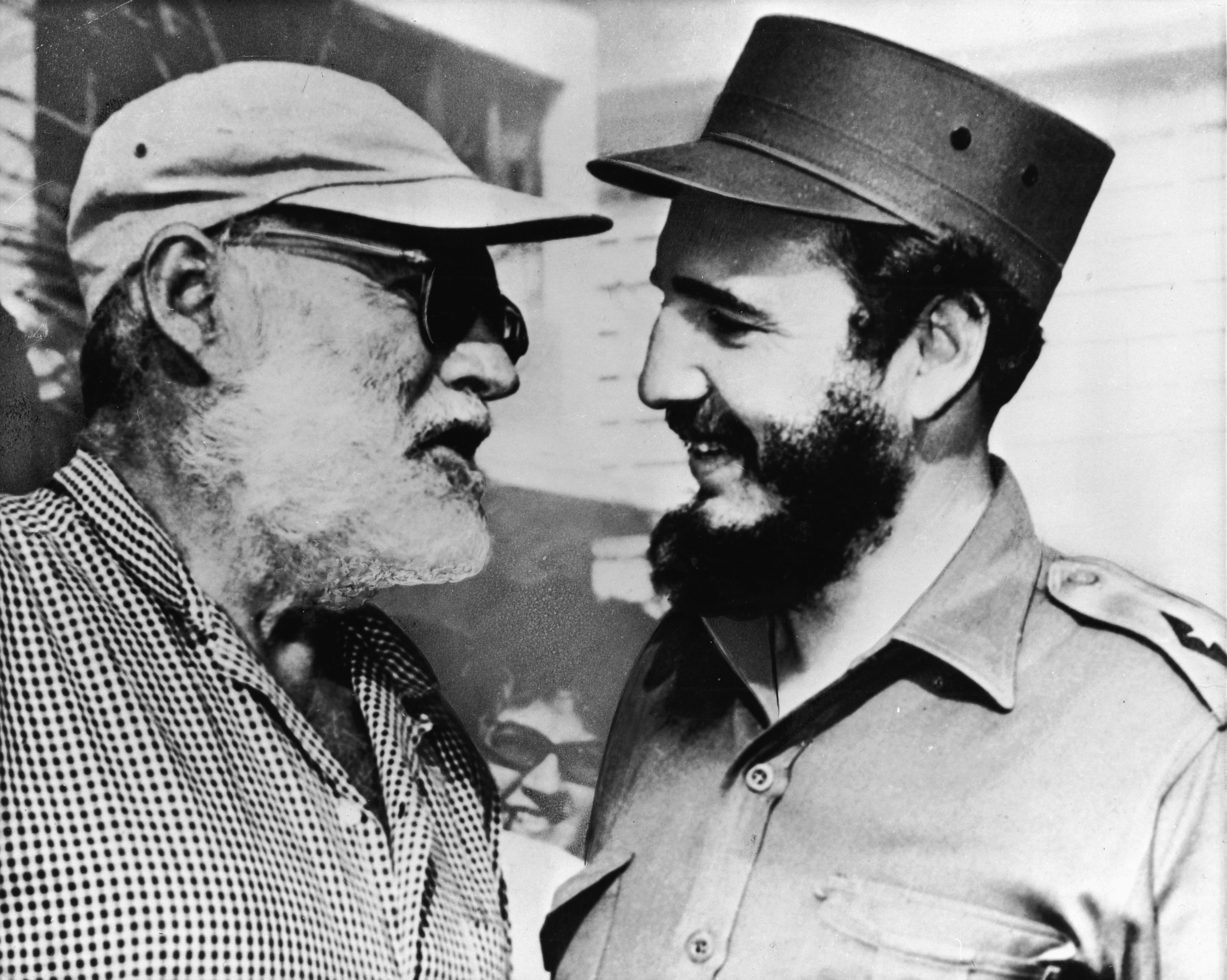 American author Ernest Hemingway speaks with Castro in Cuba in late 1959. In 1960 Hemingway was forced out of his home in Cuba due to the escalating tensions surrounding the Castro regime and moved to Idaho.