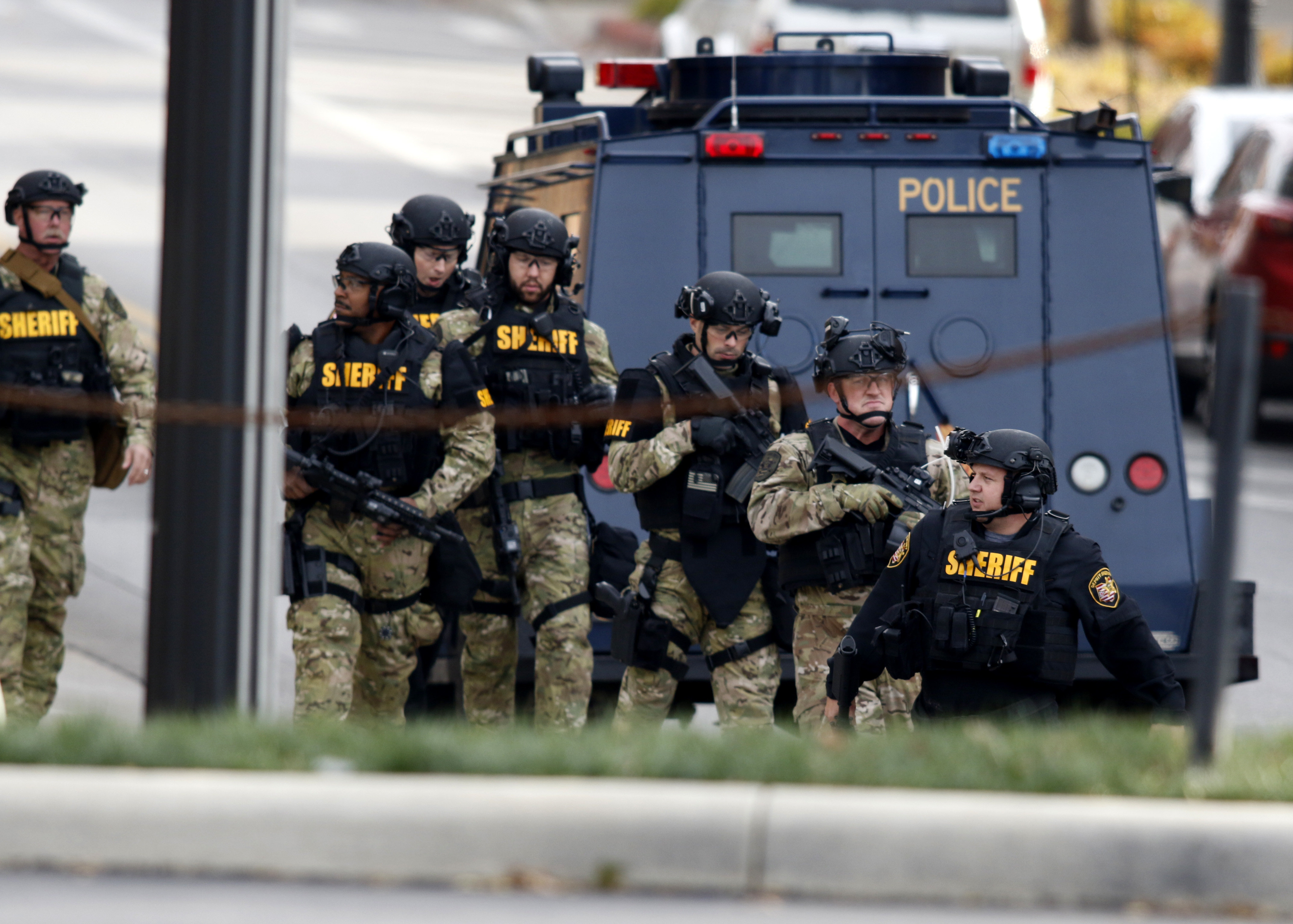 Law enforcement officials are seen outside of a parking garage on the campus of Ohio State University as they respond to an active attack in Columbus, Ohio, on November 28, 2016.&nbsp;