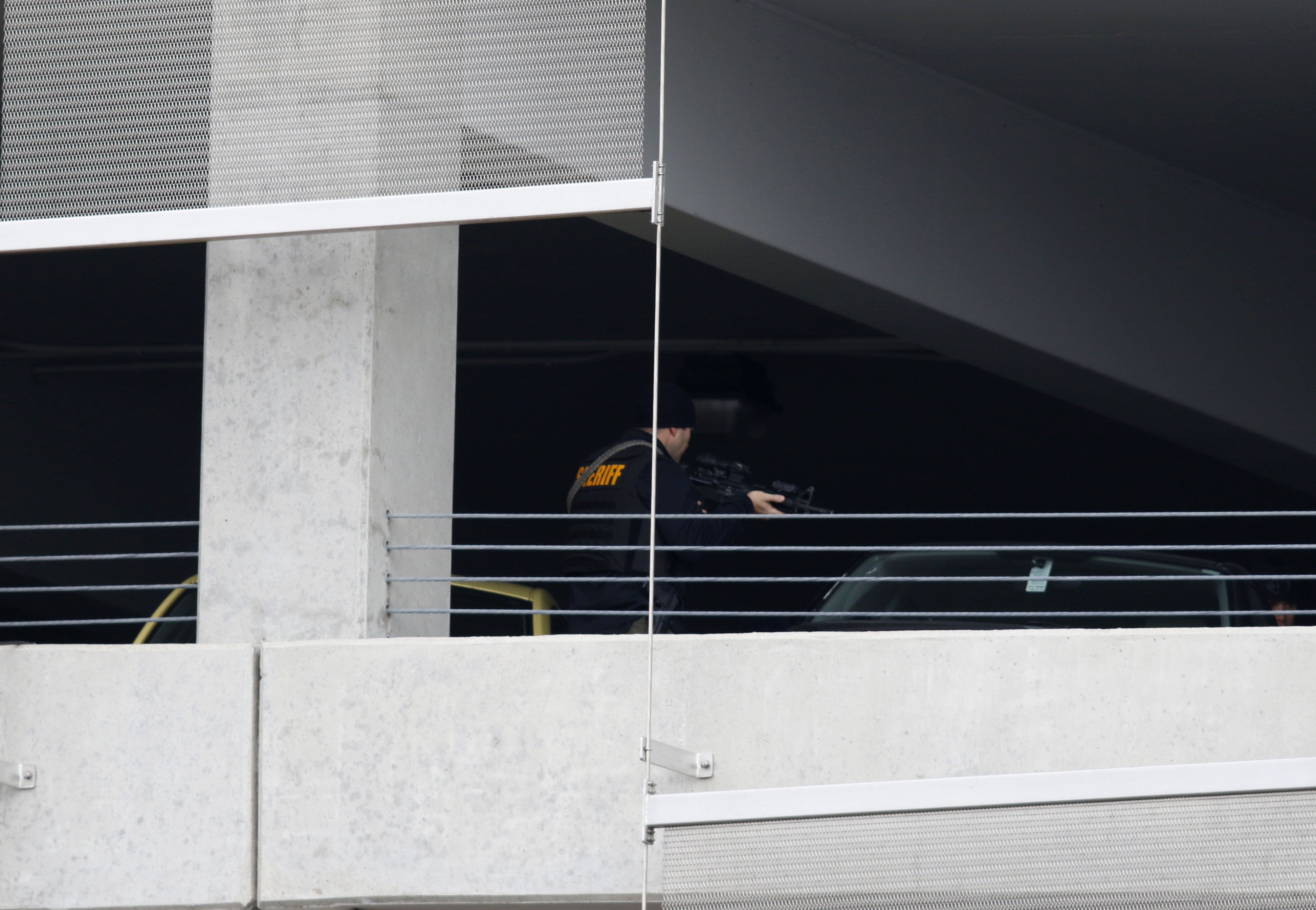 Law enforcement officials are seen searching in a parking garage on the campus of Ohio State University as they respond to an active attack in Columbus, Ohio, on November 28, 2016.&nbsp;