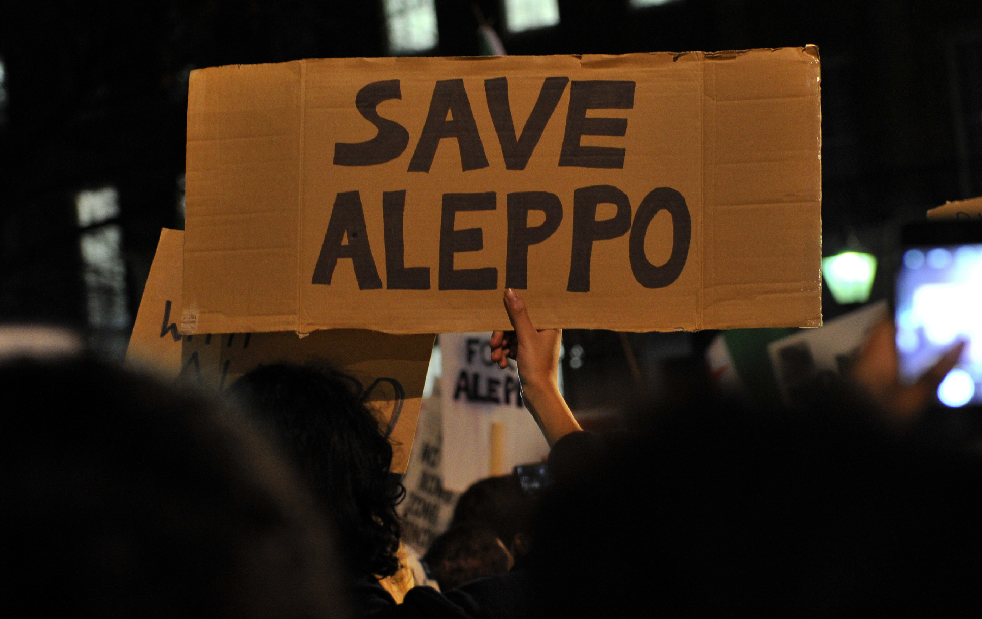 A "Save Aleppo" sign&nbsp;at the protest in London.