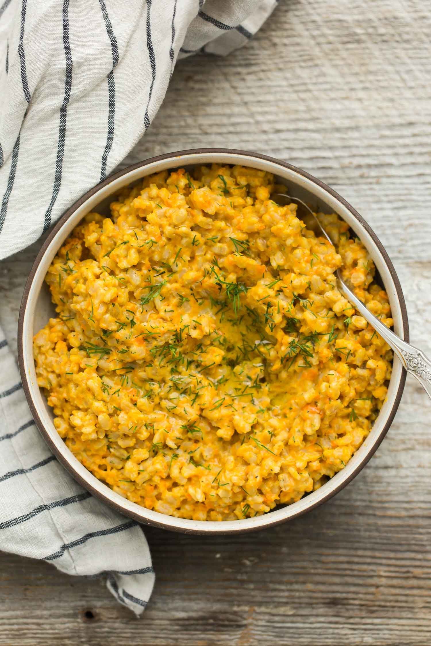 <strong>Get the <a href="https://naturallyella.com/carrot-baked-barley-risotto/" target="_blank">Carrot Baked Barley Risotto recipe</a>&nbsp;from Naturally Ella</strong>