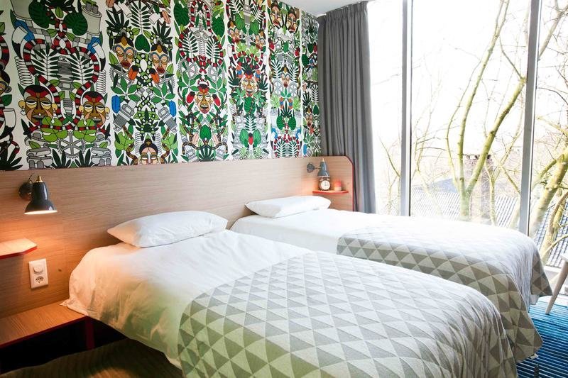This <a href="https://generatorhostels.com/en/destinations/amsterdam/?gclid=CjwKEAiAkuLDBRCRguCgvITww0YSJAAHrpf-KPQ0pR69hZMHmE0IvM1b3LzZdv7TA8eeS4fI1sRzyxoCRiXw_wcB" target="_blank">former university building</a>&nbsp;employs an old lecture hall as its common area and a boiler room as its secret after-hours&nbsp;bar.&nbsp;There are bikes to&nbsp;rent for <a href="http://www.huffingtonpost.com/entry/how-to-survive-biking-in-amsterdam-or-anywhere_us_55b2a95de4b0074ba5a4a48d">canal rides</a>&nbsp;and rooms with&nbsp;calming views of nearby <a href="http://www.amsterdam.info/parks/oosterpark/" target="_blank">Oosterpark</a>. <i>$16 and up.</i>