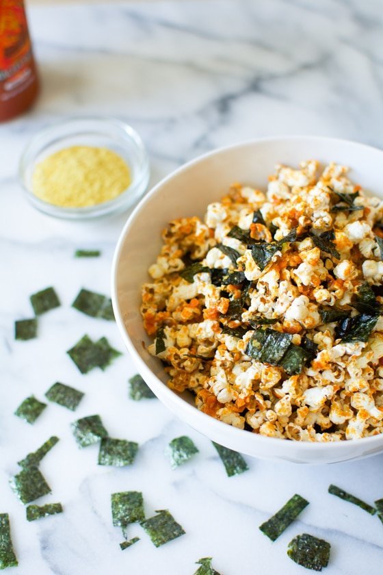 <strong>Get the <a href="http://rootandrevel.com/coconut-oil-sriracha-popcorn-with-nori/" target="_blank">Sriracha Popcorn with Nori recipe</a>&nbsp;from Root And Revel<br /><br /></strong>Nori is sprinkled on top of this popcorn.