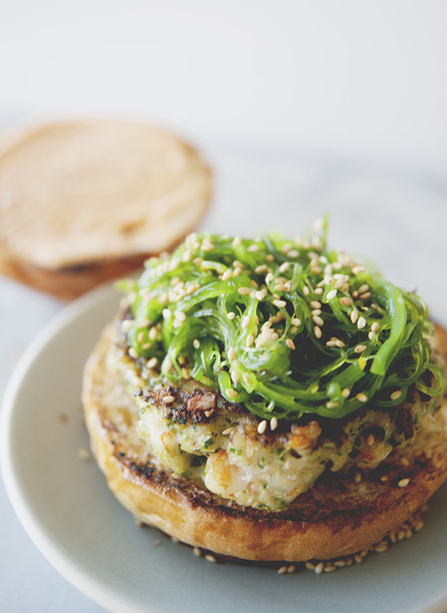 <strong>Get the <a href="http://www.thekitchykitchen.com/?recipes=/shrimp-burger-wakame-slaw" target="_blank">Shrimp Burger With Wakame recipe</a>&nbsp;from The Kitchy Kitchen<br /><br /></strong>A seaweed salad made with wakame is tops this shrimp burger.