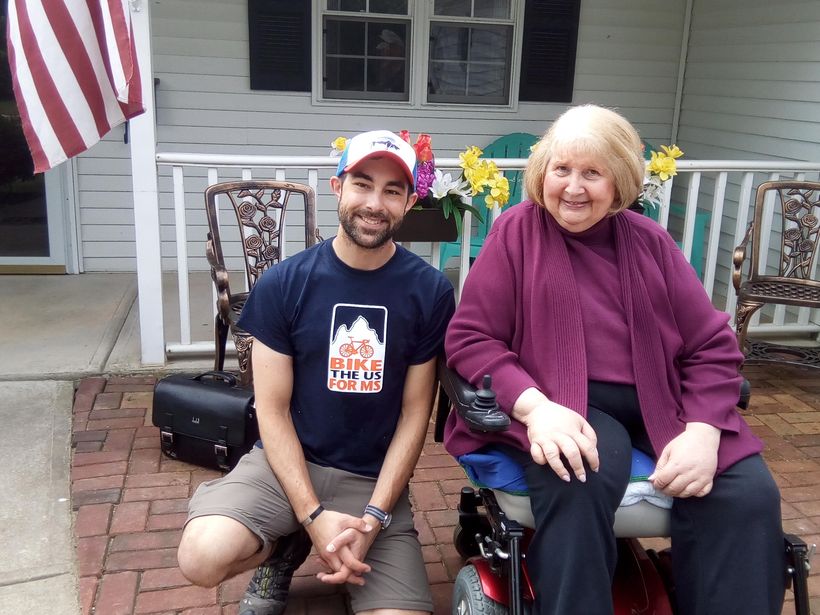 Brian Joseph has family members with MS. He took a break to chat with Mary Namy, one of 3 women with MS who share a home in E