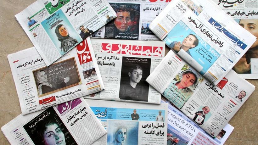 A picture taken in the capital Tehran on July 16 2017, shows some front pages of Iranian newspapers made an unprecedented mov