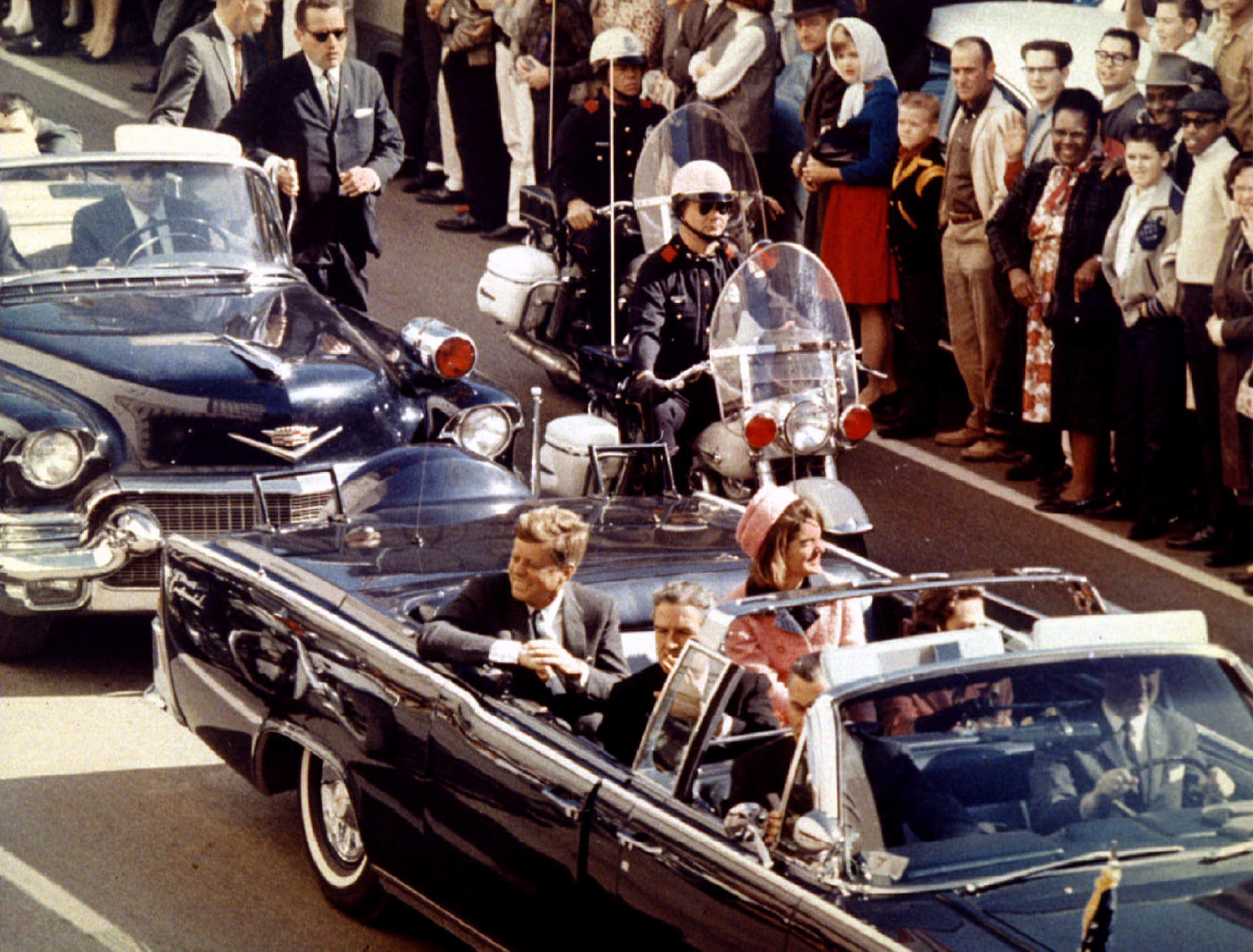 <strong>President Kennedy and his wife ride through Dallas moments before the assassination&nbsp;</strong>