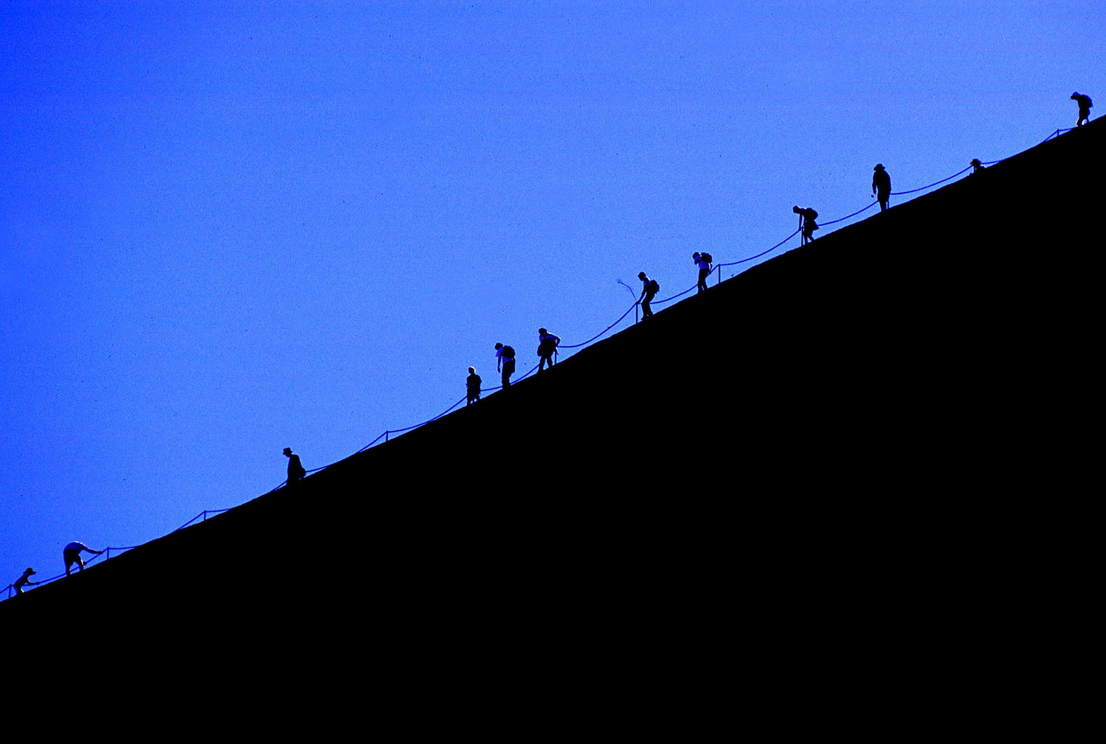 <strong>Tourists pictured climbing the tourist attraction in 1997</strong>