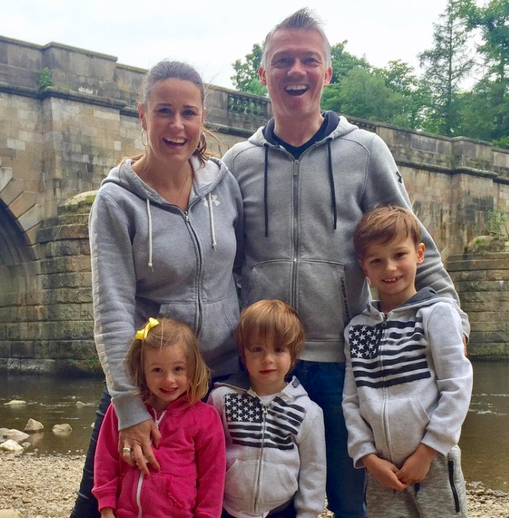 Helen Davis with her partner and children, nine-year-old Zac and four-year-old twins Anya and Xavi.