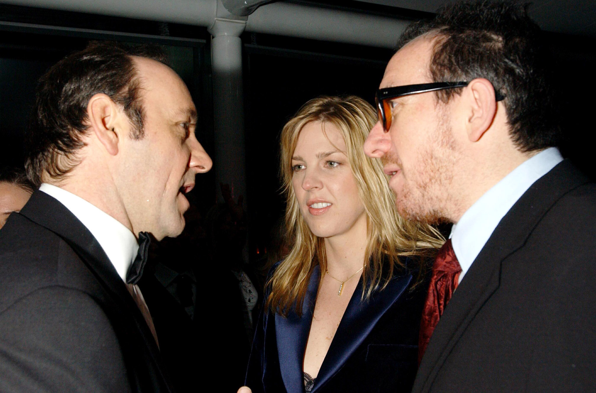 Kevin Spacey (left) at a party in London during his time as artistic director of the Old Vic