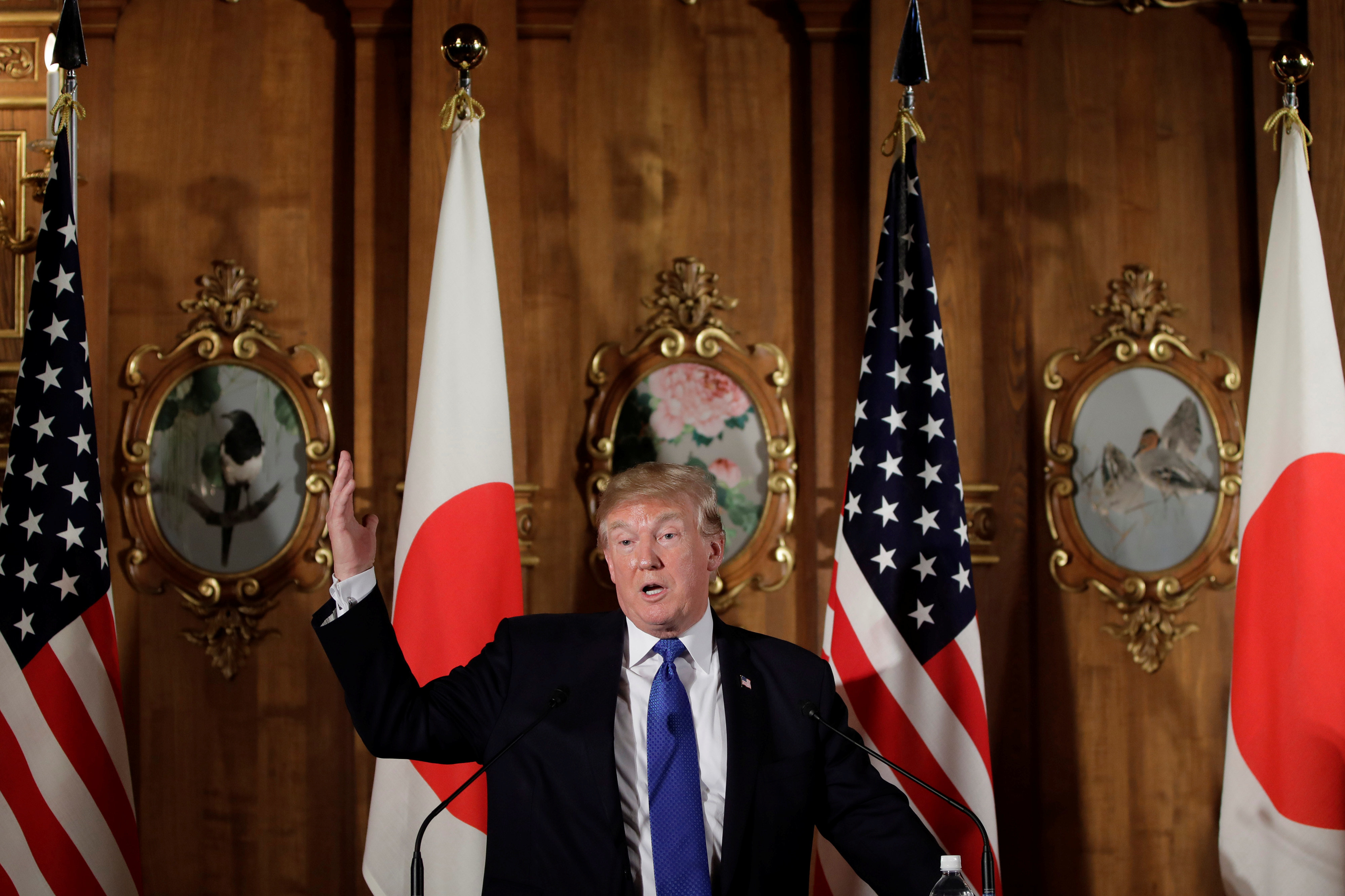 <strong>US President Donald Trump, seen above during a press conference in Tokyo on Monday, has said the Texas church shooting was not a 'gun issue'</strong>