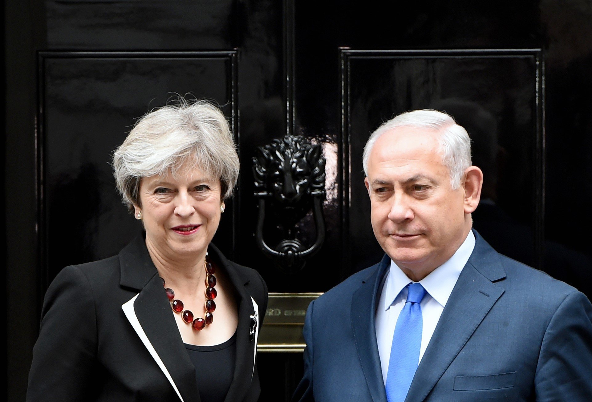 Theresa May greets&nbsp;Israeli Prime Minister Benjamin Netanyahu. She did not know at the time that Priti Patel has also met him.