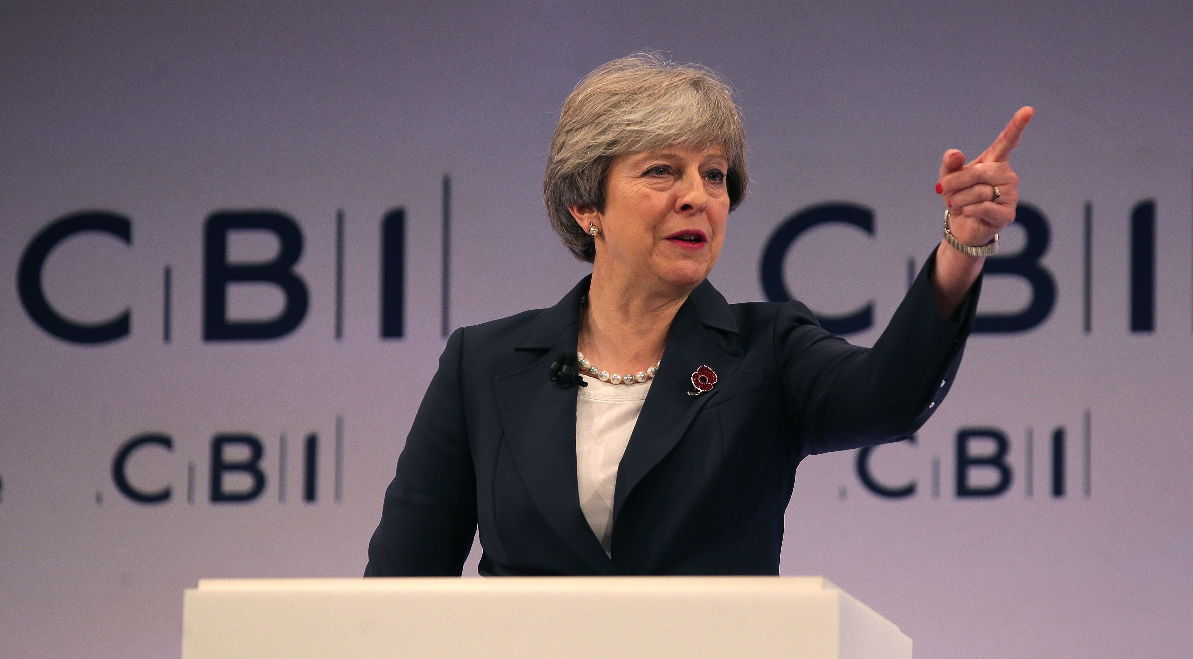 <i>Theresa May addresses delegates at the annual Confederation of British Industry (CBI) conference in east London, on November 6, 2017.&nbsp;</i>