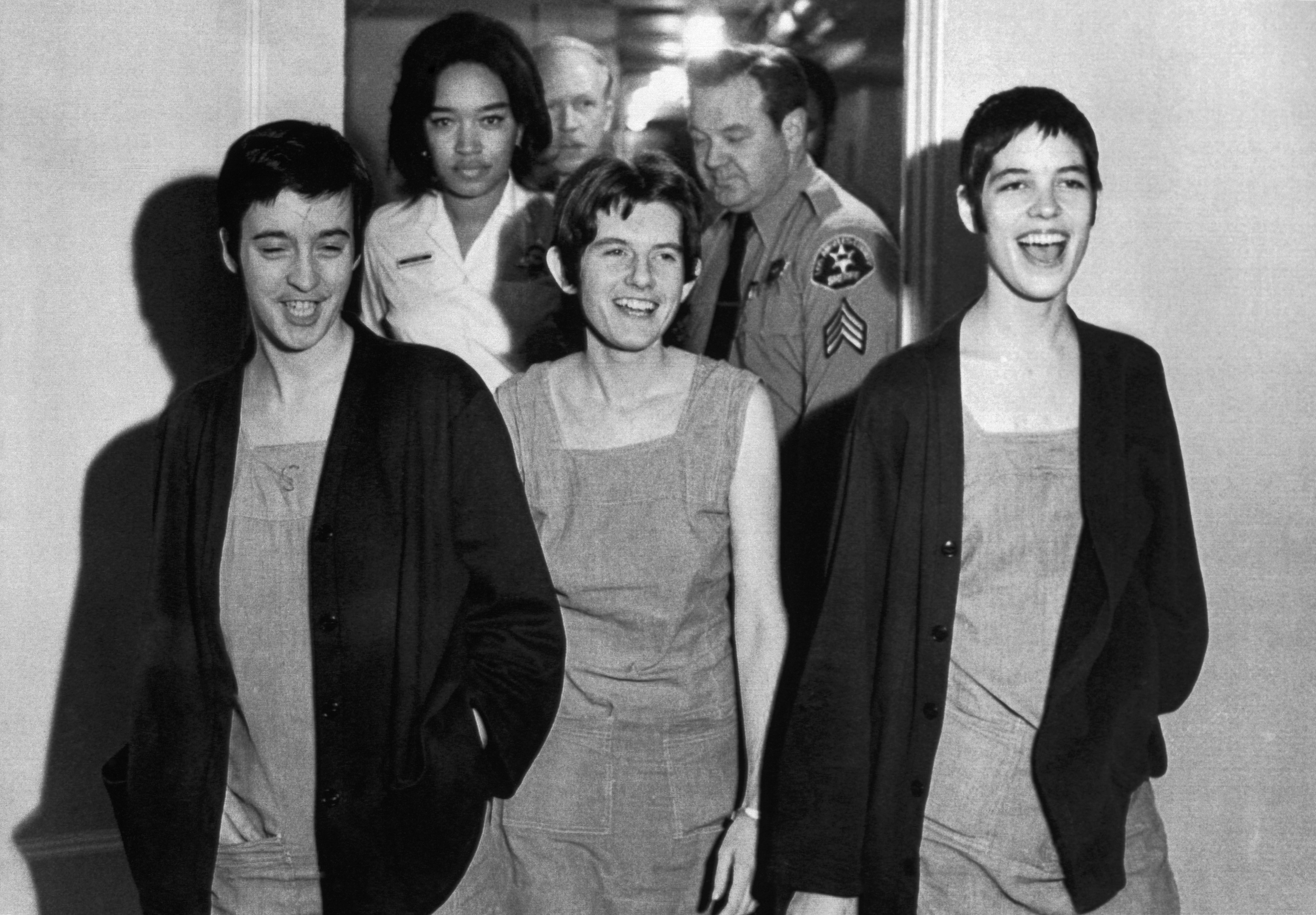 <strong>Susan Denise Atkins, left, Patricia Krenwinkel and Leslie Van Houten laugh after receiving the death sentence</strong>