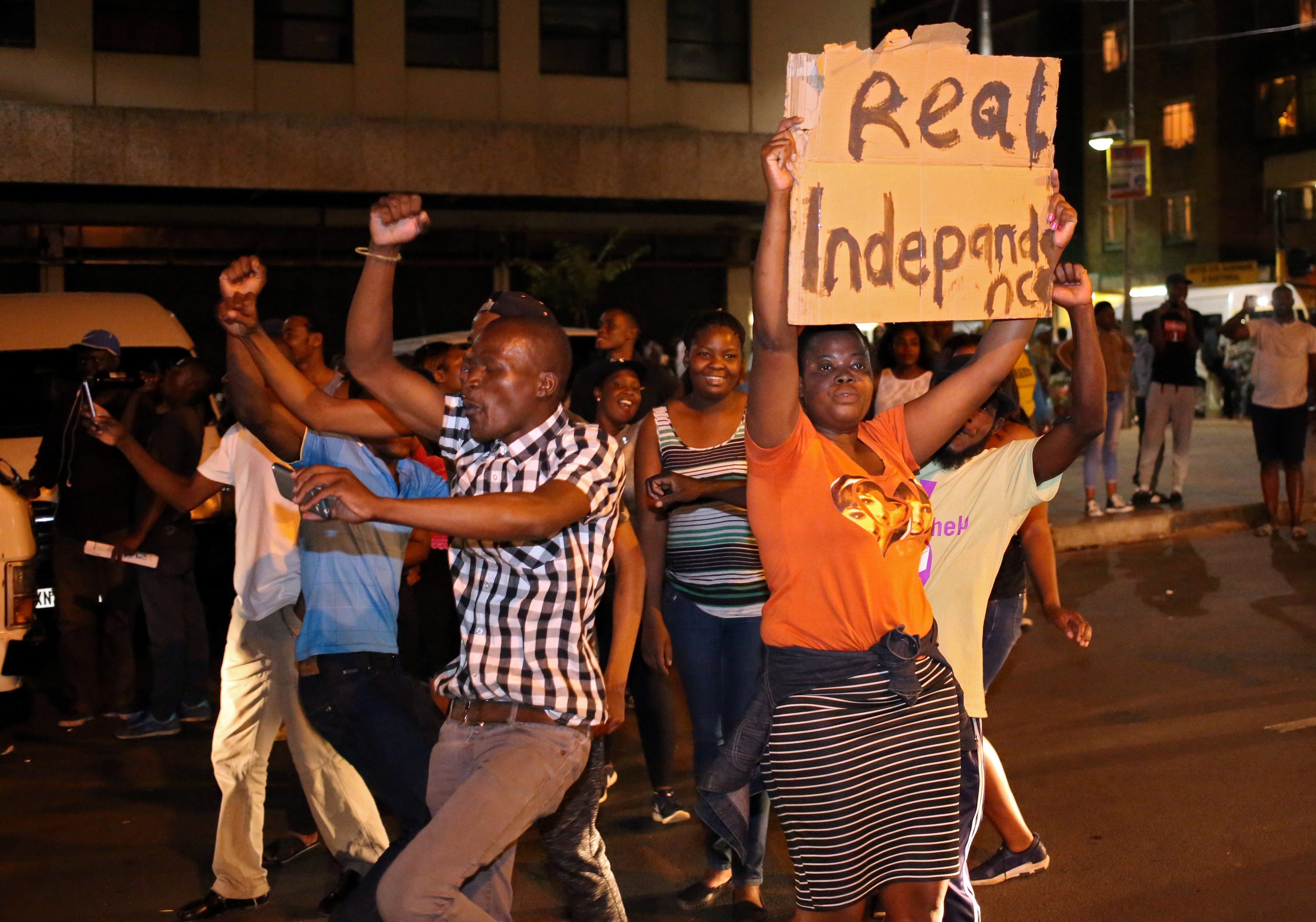 <strong>Zimbabweans danced in the streets after Mugabe resigned&nbsp;</strong>