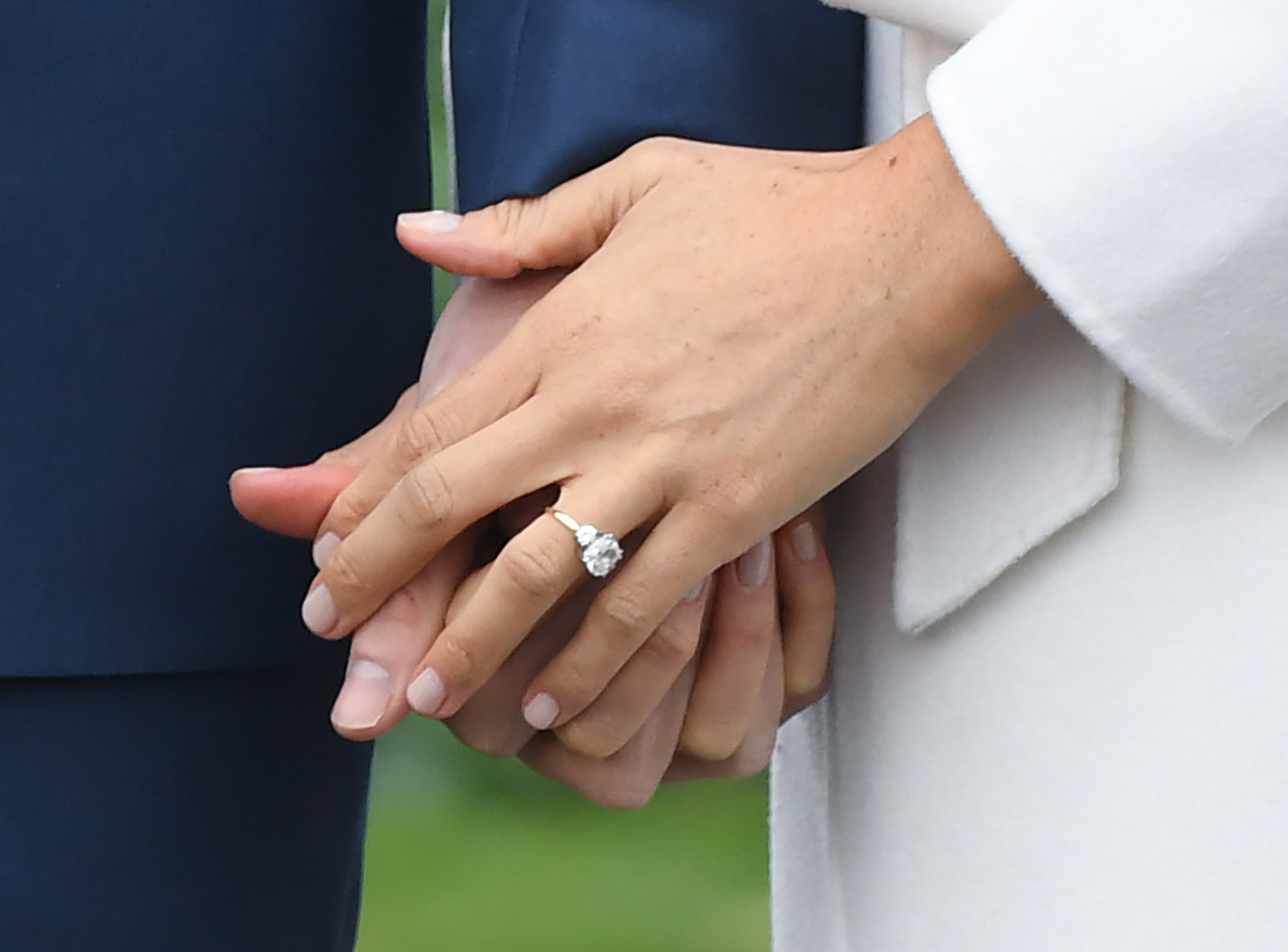 <strong>Harry designed Megan's engagement ring himself using a diamond from Botswana, as well as two from Princess Diana's personal collection</strong>