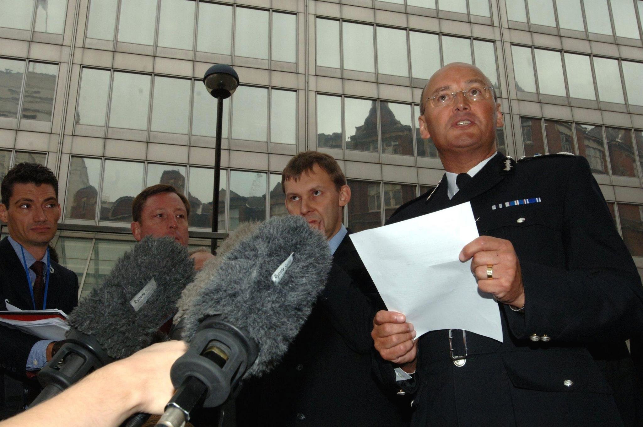 <strong>Then-Deputy Commissioner Paul Stephenson giving a press briefing outside Scotland Yard in 2006</strong>