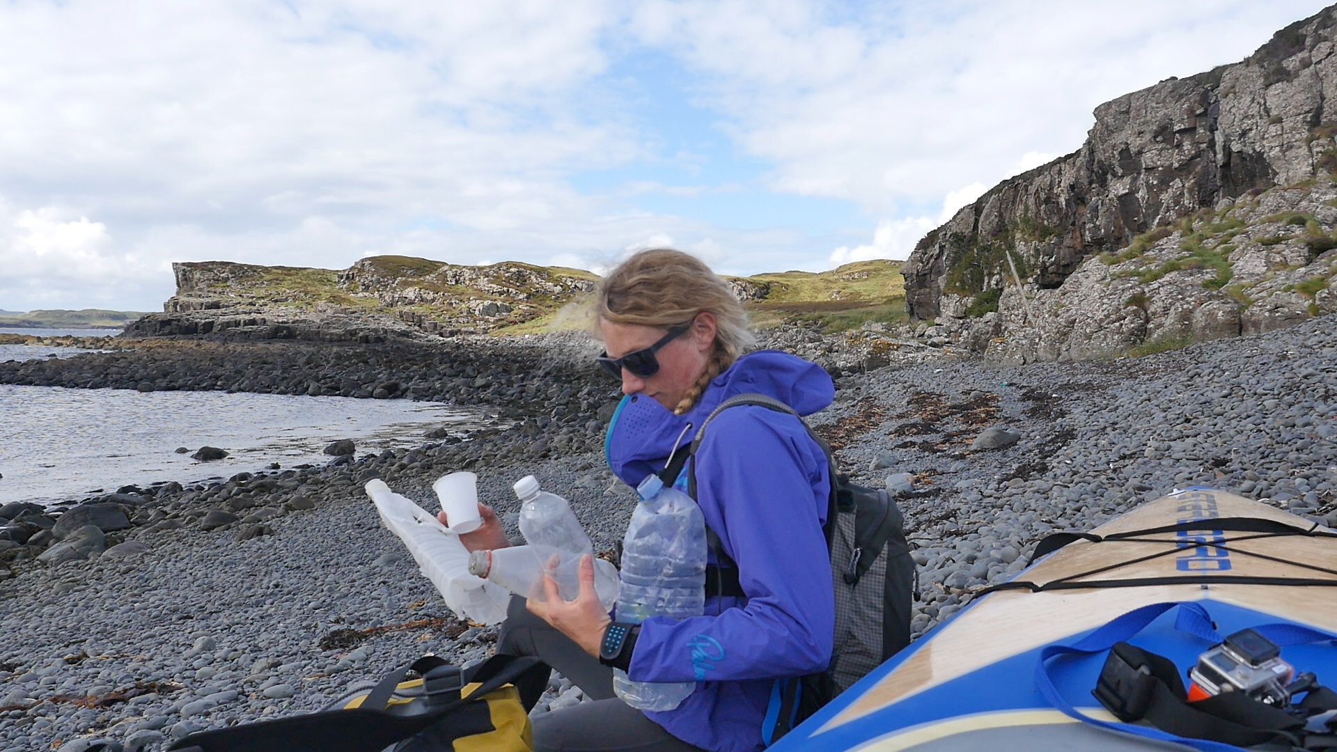 <strong>Cal Major with&nbsp;some of the plastic litter she collected on the Isle of Skye. Look closely and you'll spot more in the distance</strong>
