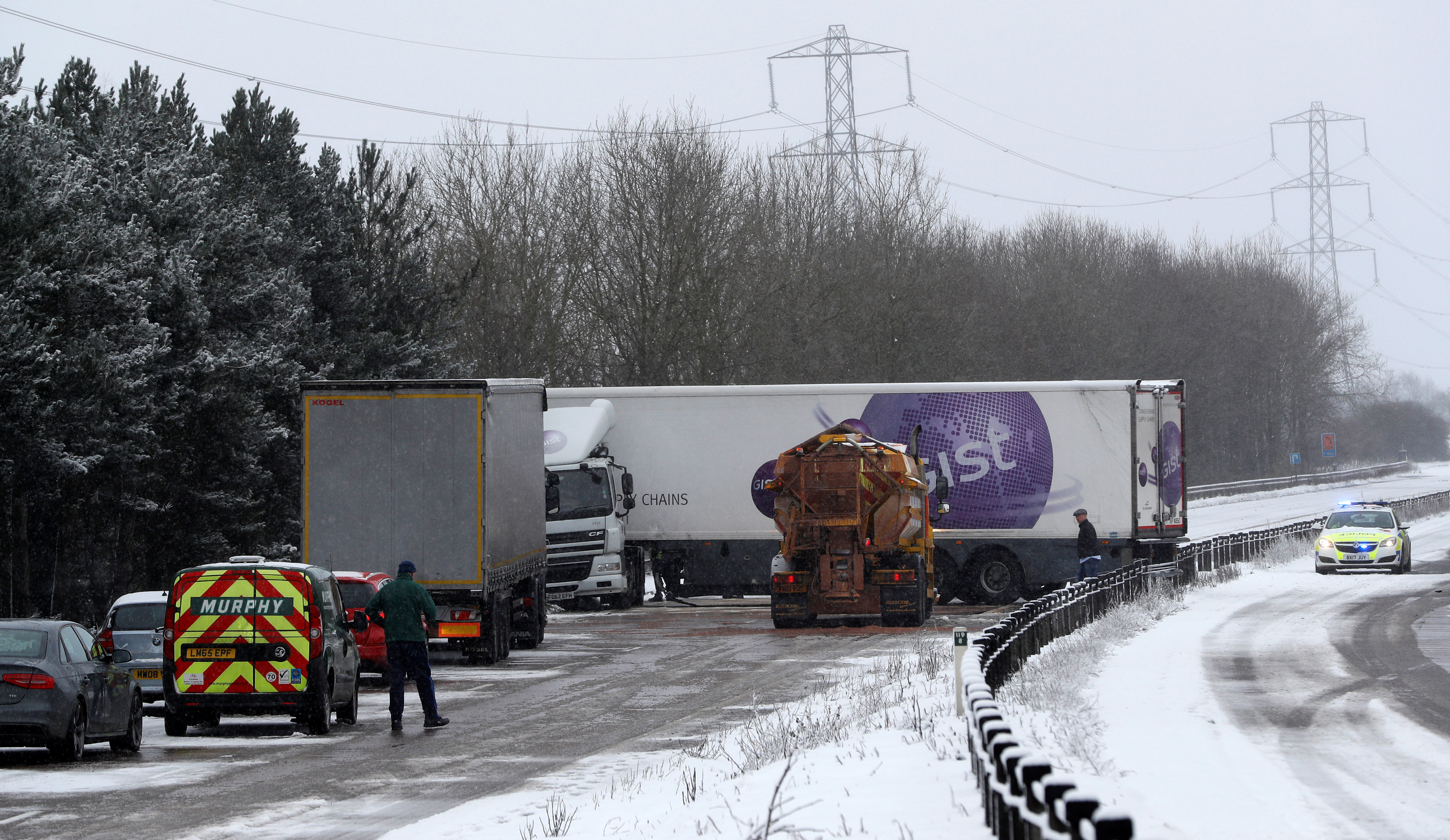 <strong>A lorry crashed on the busy A50 amid snow near Uttoxeter, Staffordshire, on Sunday</strong>