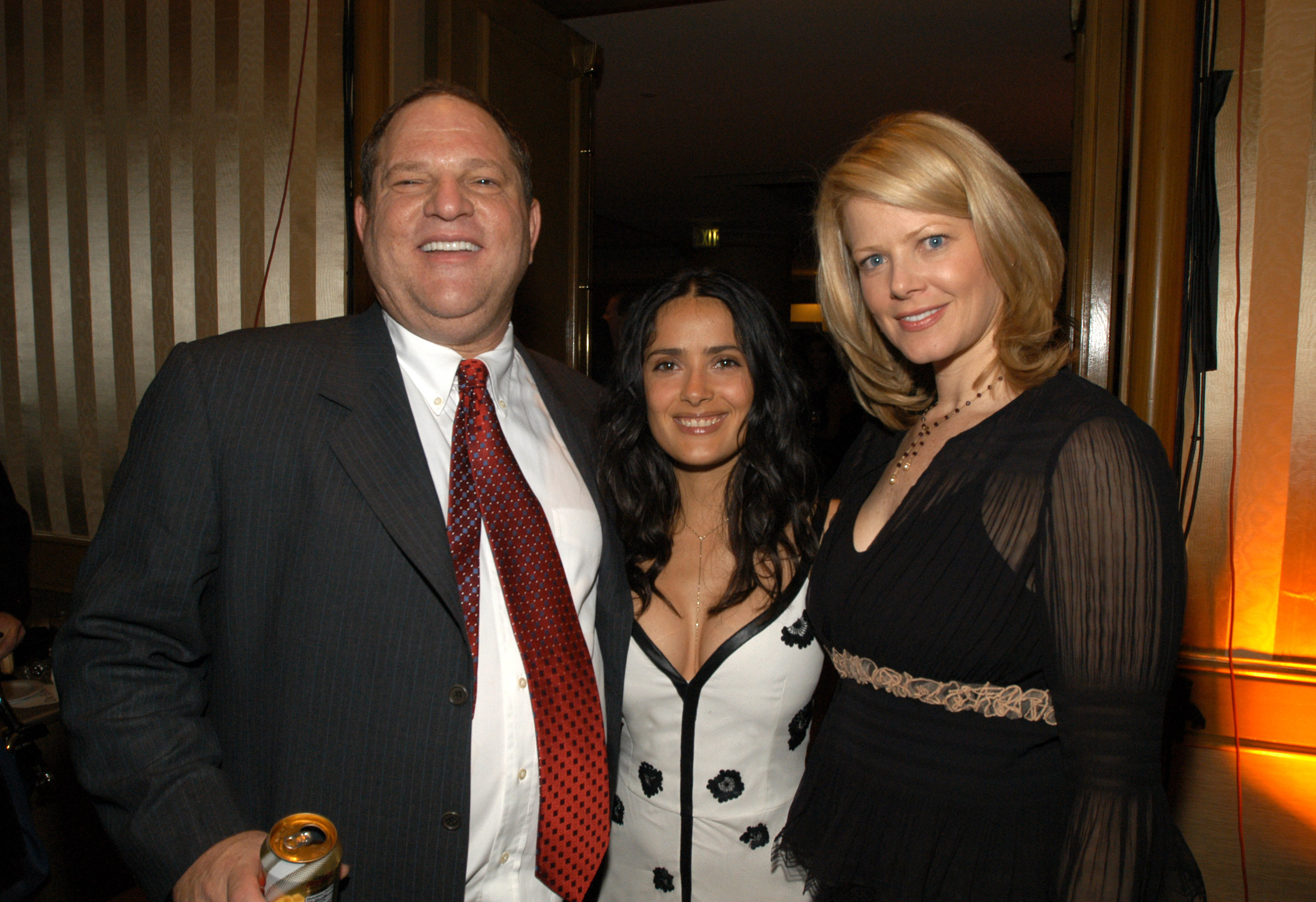 Harvey Weinstein, Salma Hayek, and his wife&nbsp;pictured in 2003.