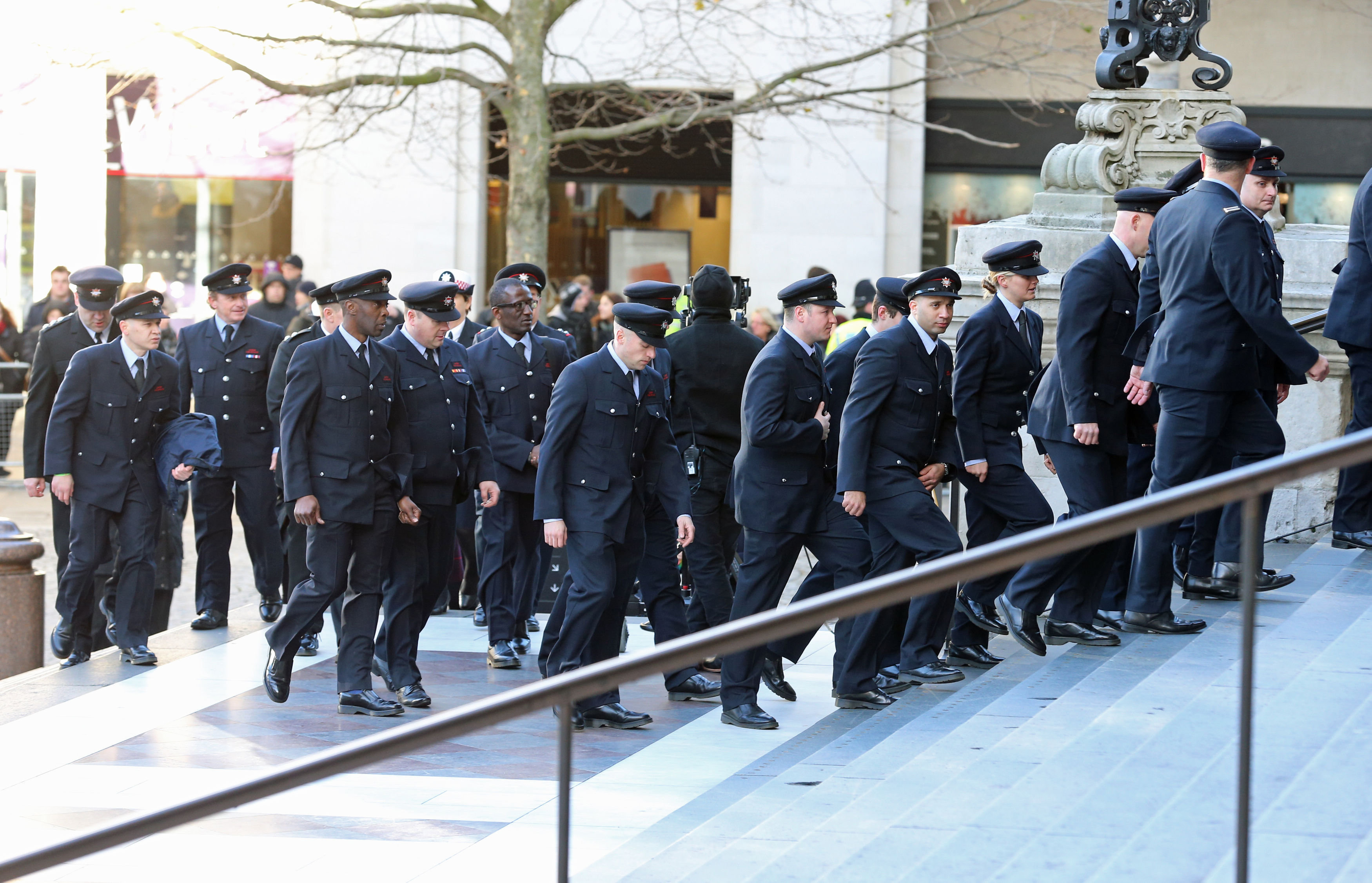 <strong>Firefighters are among the crowd of 1,500 people in attendance at the service&nbsp;</strong>