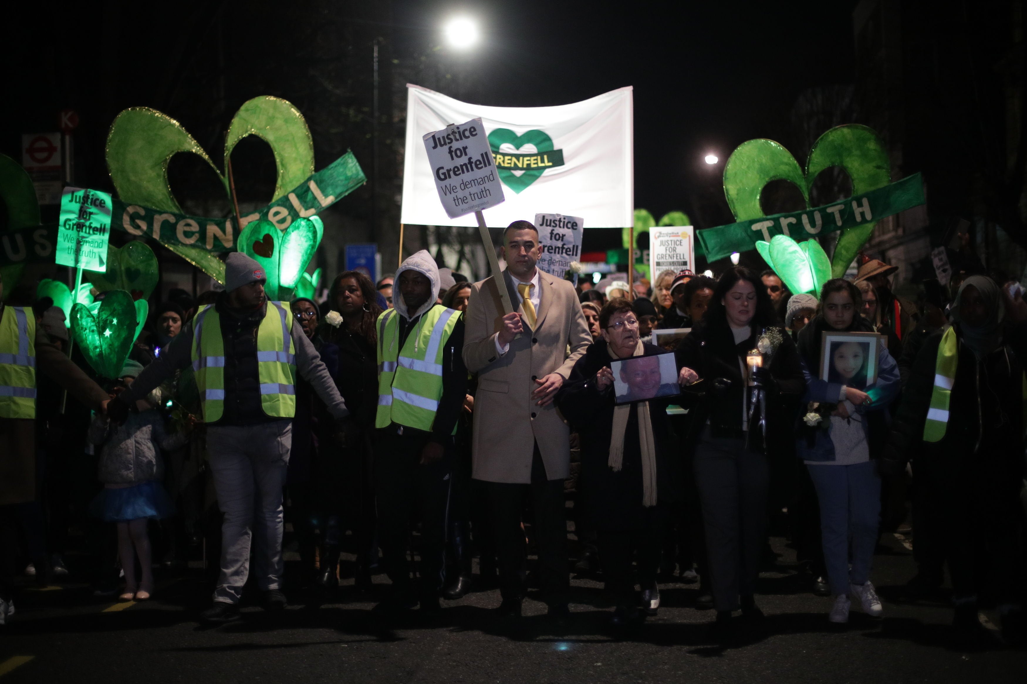 <strong>People take part in a silent walk to mark the six month anniversary of the Grenfell Tower fire.</strong>