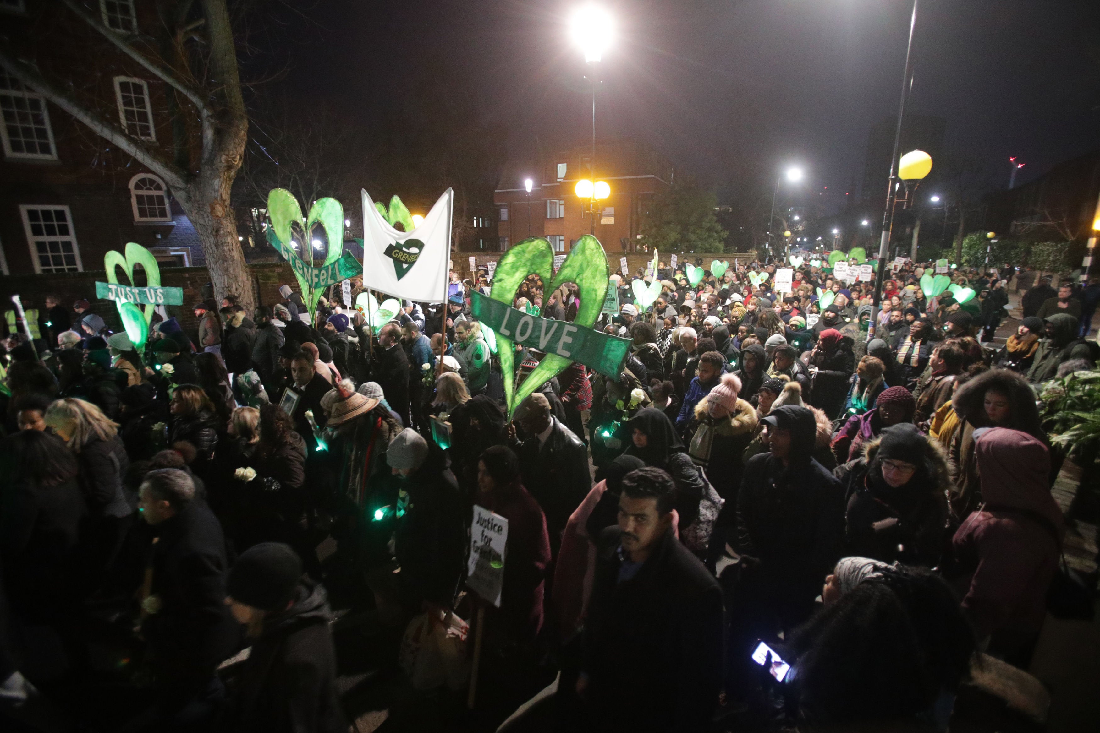 <strong>Hundreds of people take part in the silent walk on the six month anniversary of the fire.</strong>