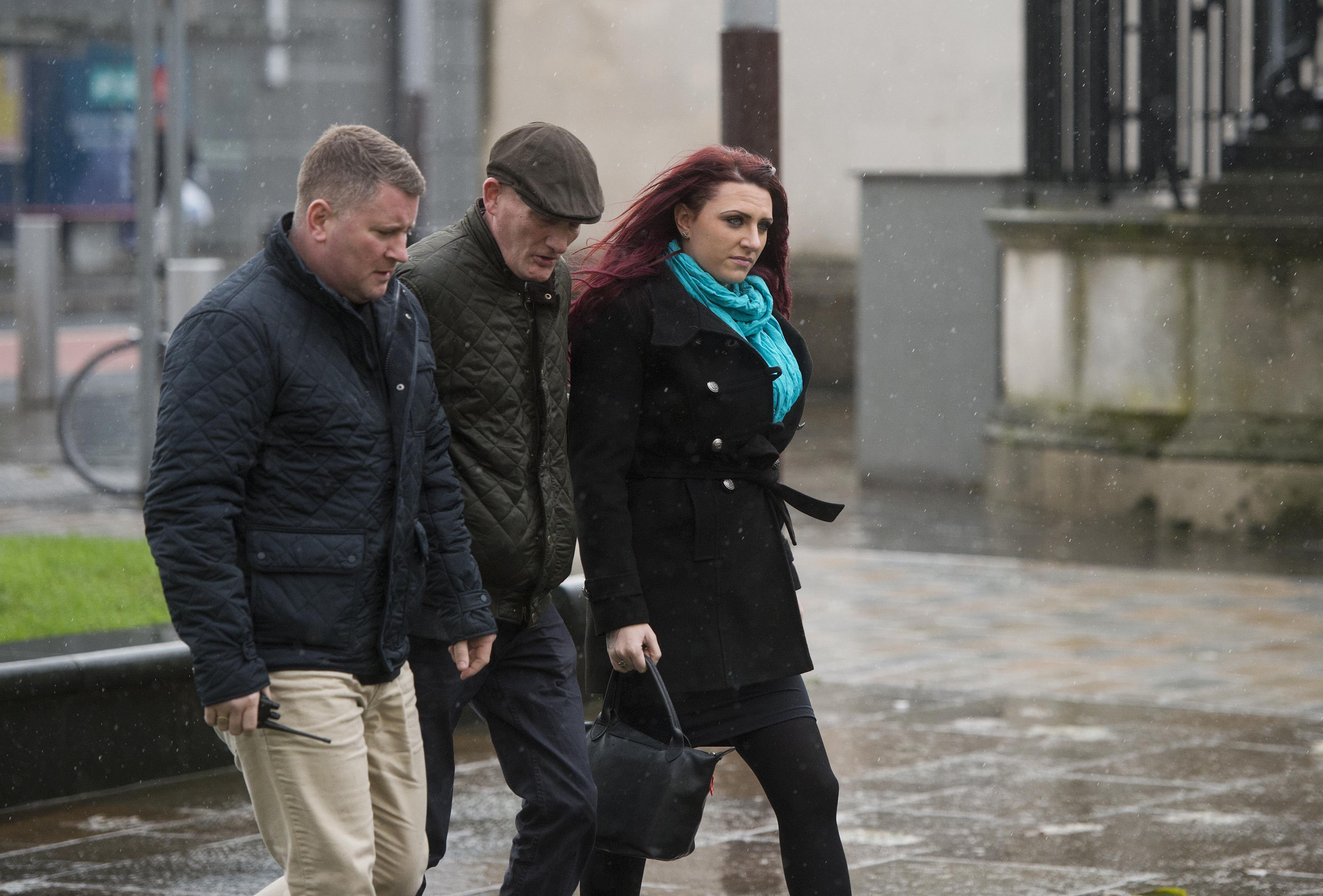 <strong>Golding, left, with deputy leader Jayda Fransen (right) arriving at Belfast Laganside courts on Thursday&nbsp;</strong>