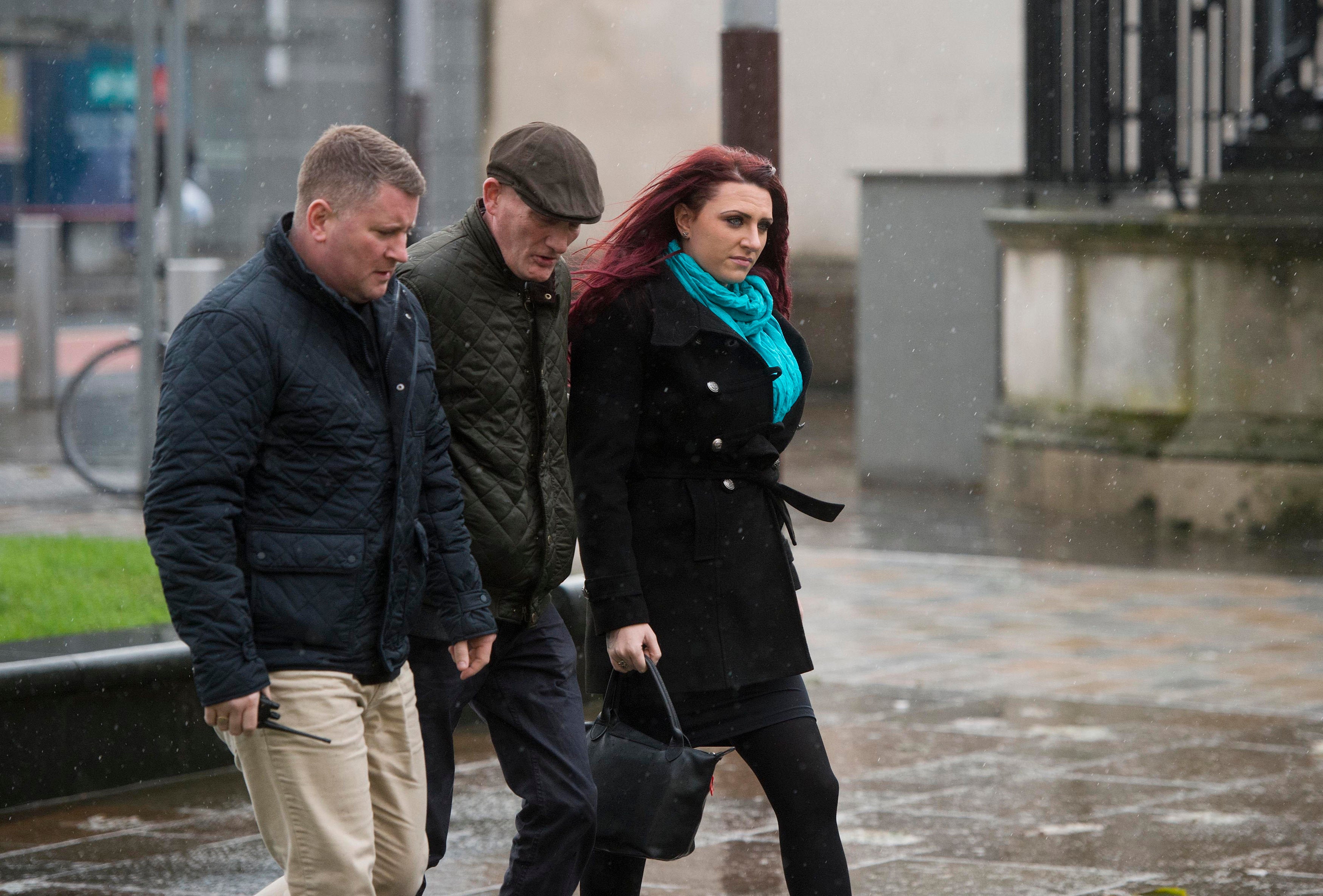 <strong>Golding, left, with deputy leader Jayda Fransen (right) arriving at Belfast Laganside courts on Thursday&nbsp;</strong>