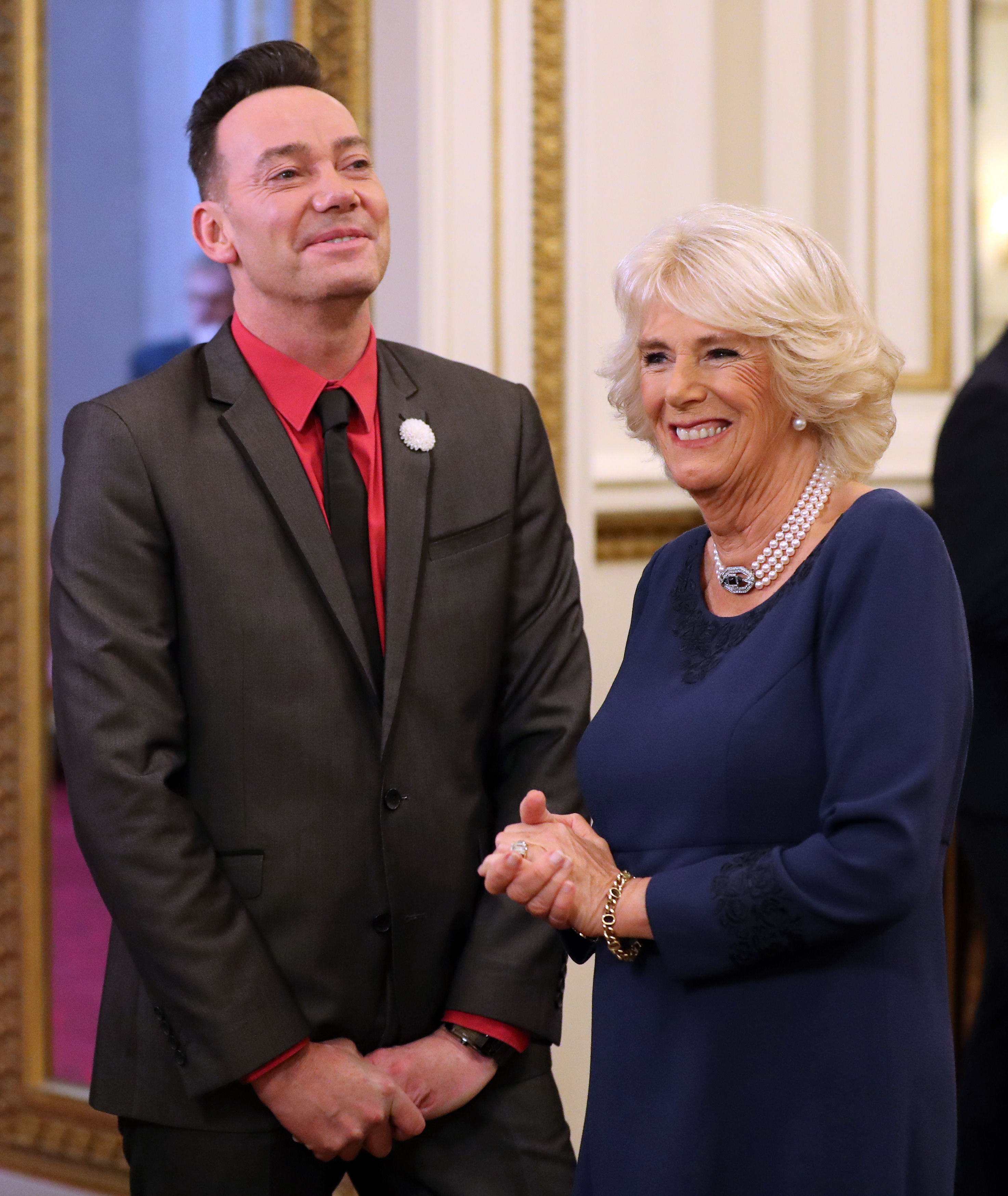 <strong>Craig Revel Horwood and the Duchess of Cornwall at Buckingham Palace</strong>