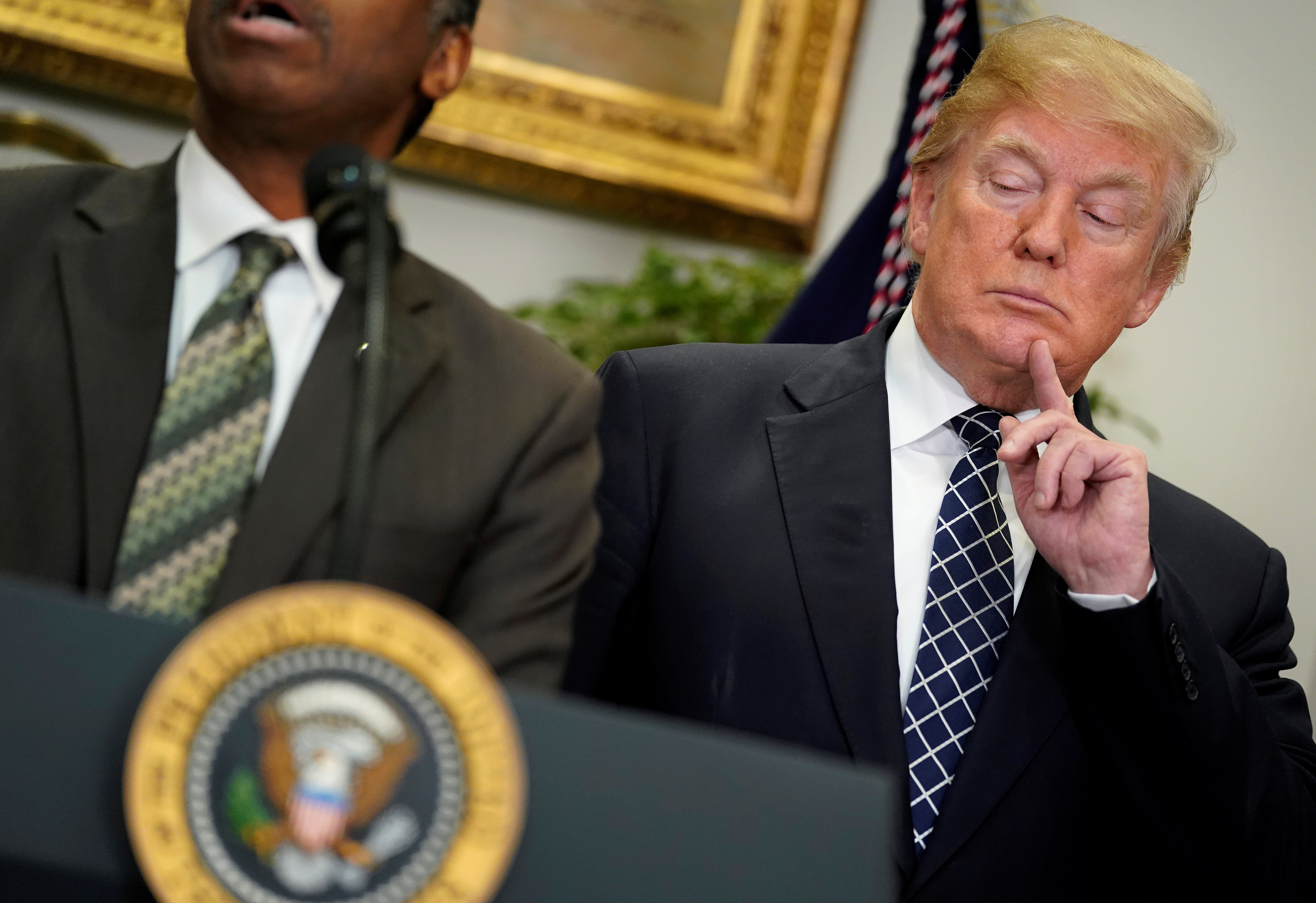 <strong>Donald Trump before signing a proclamation to honour Dr Martn Luther King Jr yesterday.</strong>