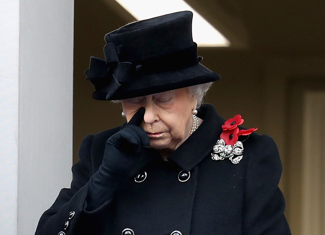 The Queen as she watches Prince Charles lay a wreath at the Cenotaph on Remembrance Sunday, 2017, the first time she has not done it herself as monarch.