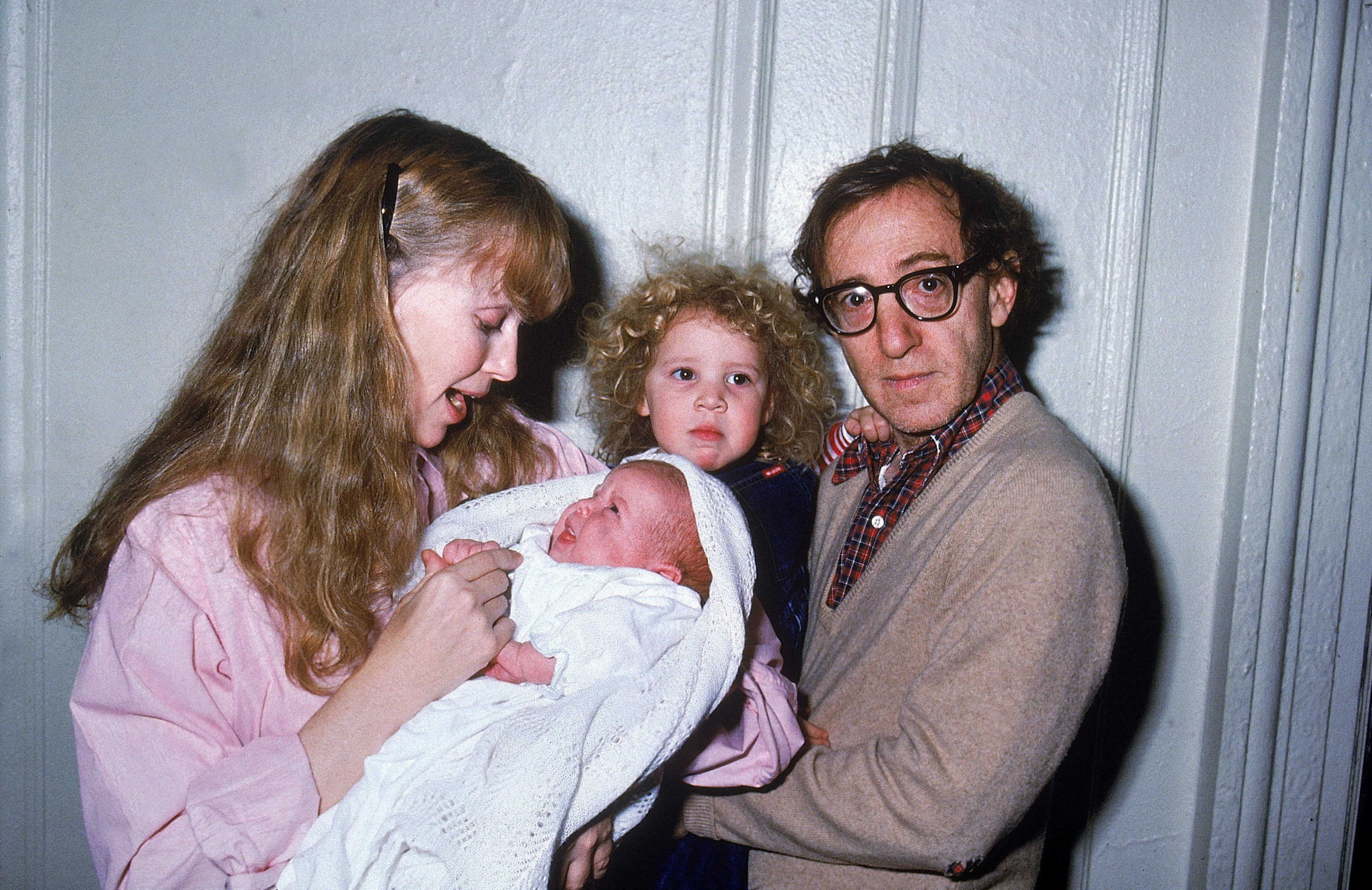 Dylan (back) with her parents and baby brother.