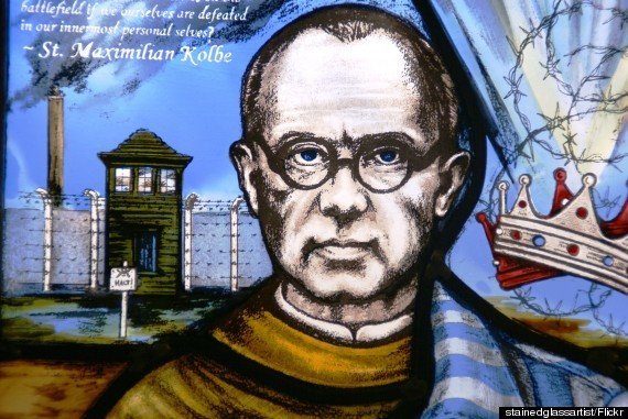 <strong>Kolbe, who was made a Christian saint in 1982, is pictured on a church window</strong>