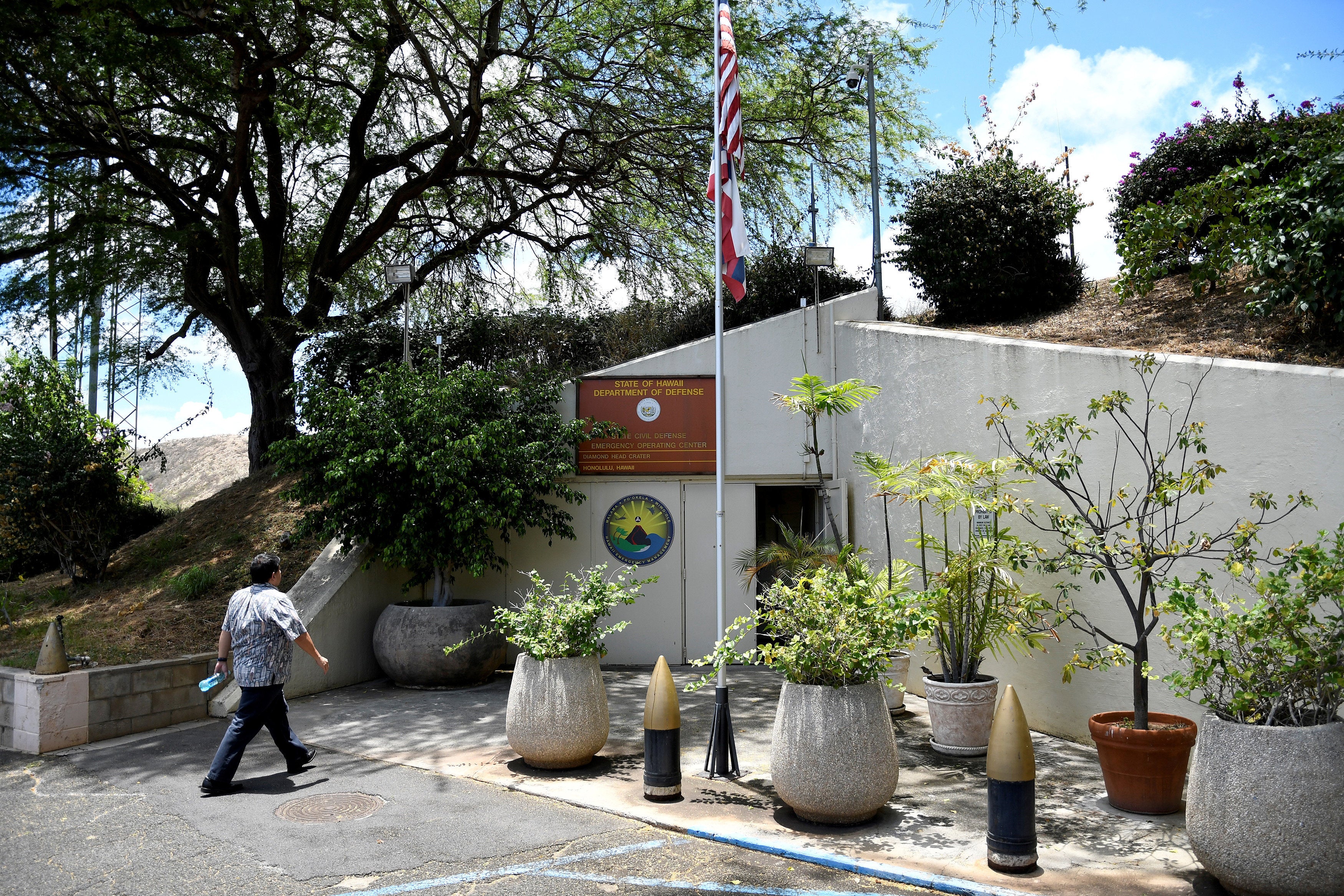 <strong>An Oahu civil defence employee enters the civil defence command bunker in Honolulu</strong>