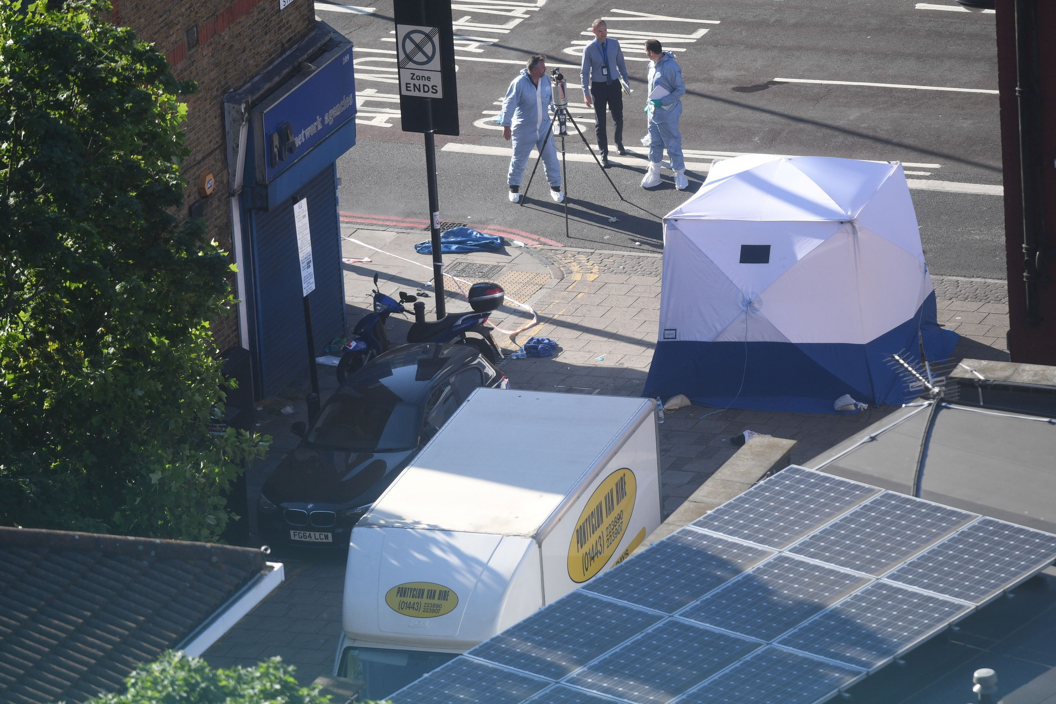 <strong>A forensic tent stands next to the van after the attack in Finsbury Park last year</strong>