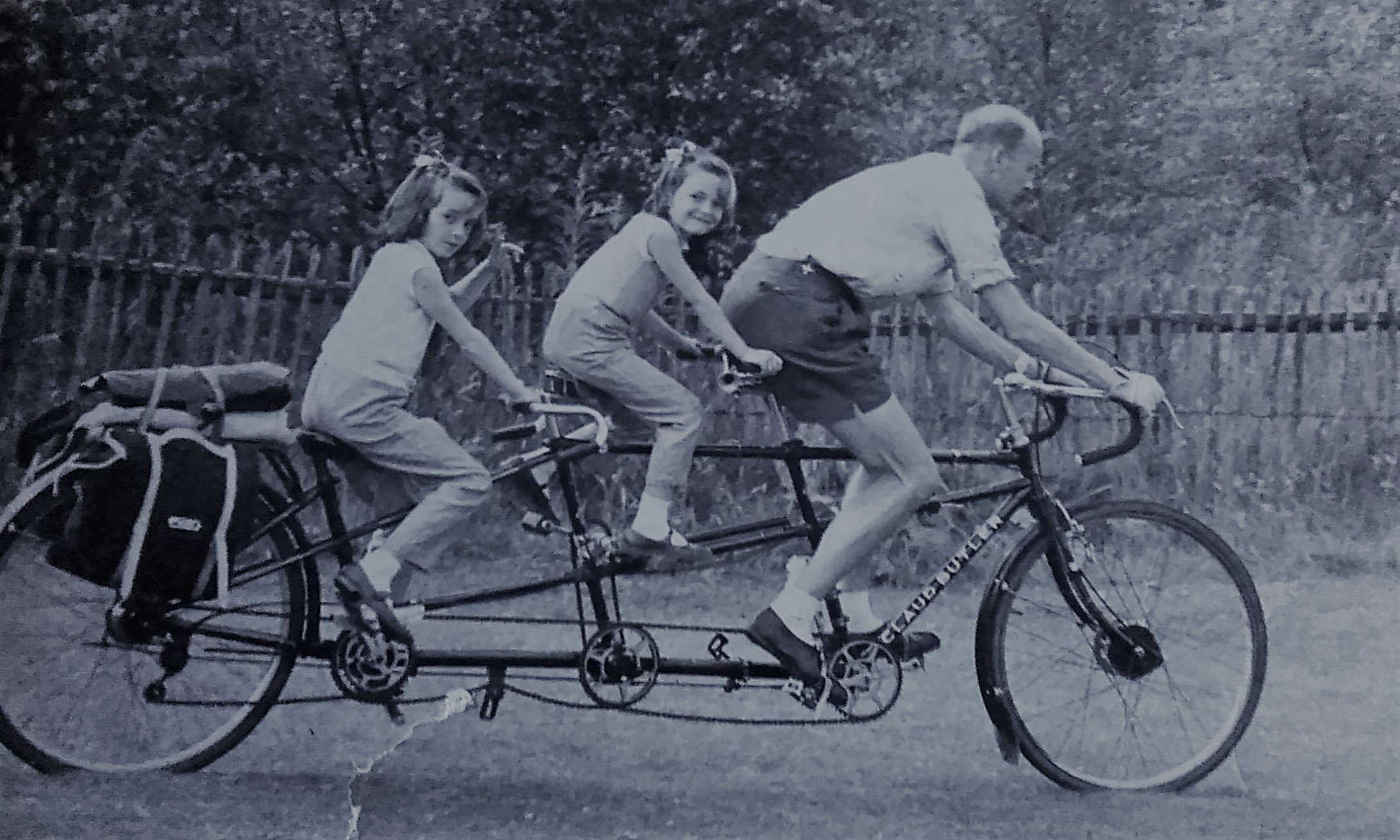 Jack and his daughters cycling in the sixties.