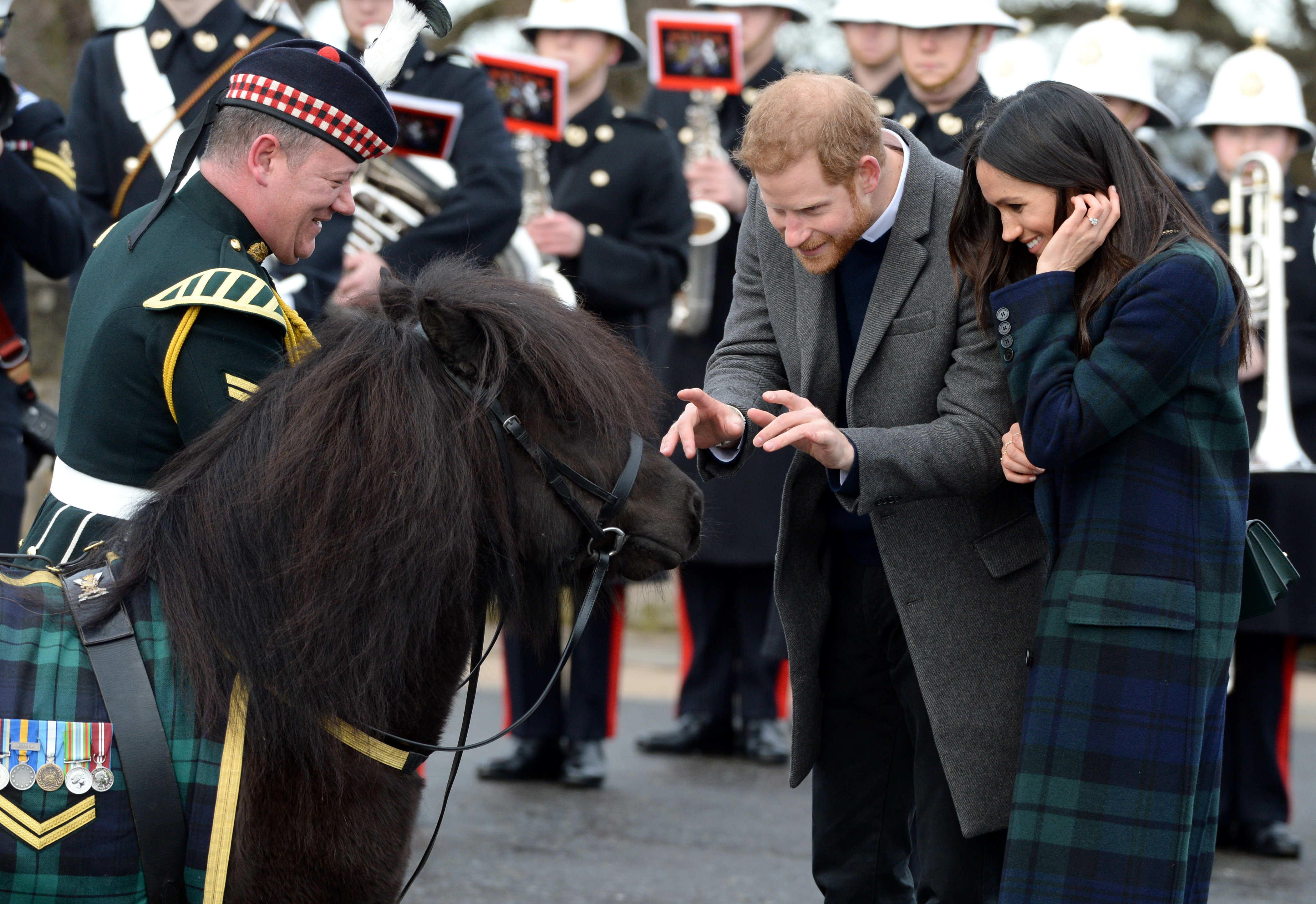 <strong>Prince Harry and Meghan Markle meet Pony Major Mark Wilkinson and regimental mascot Cruachan IV during a walkabout on the esplanade at Edinburgh Castle</strong>