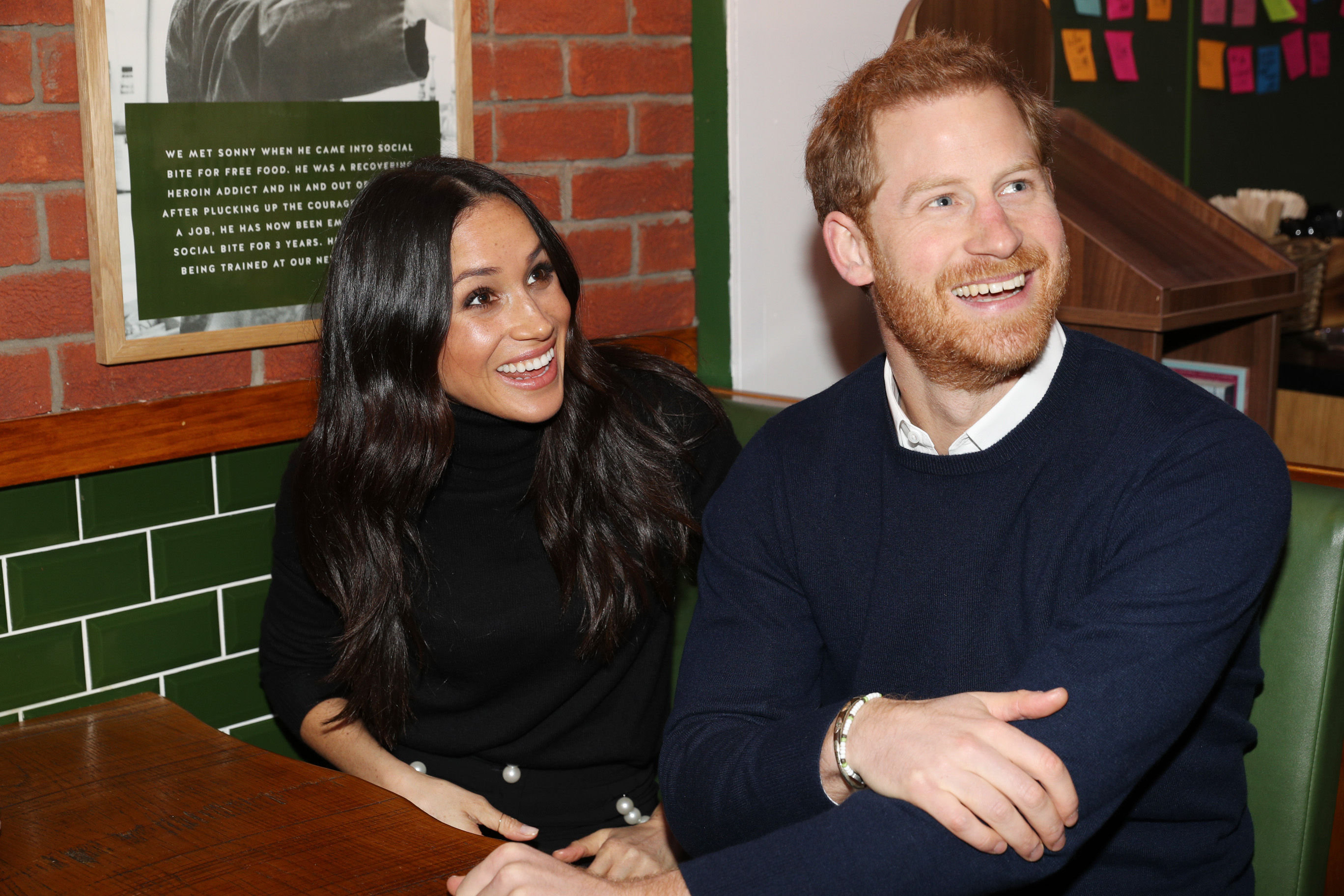 <strong>Prince Harry and Meghan Markle during a visit to Social Bite cafe in Edinburgh on Tuesday</strong>